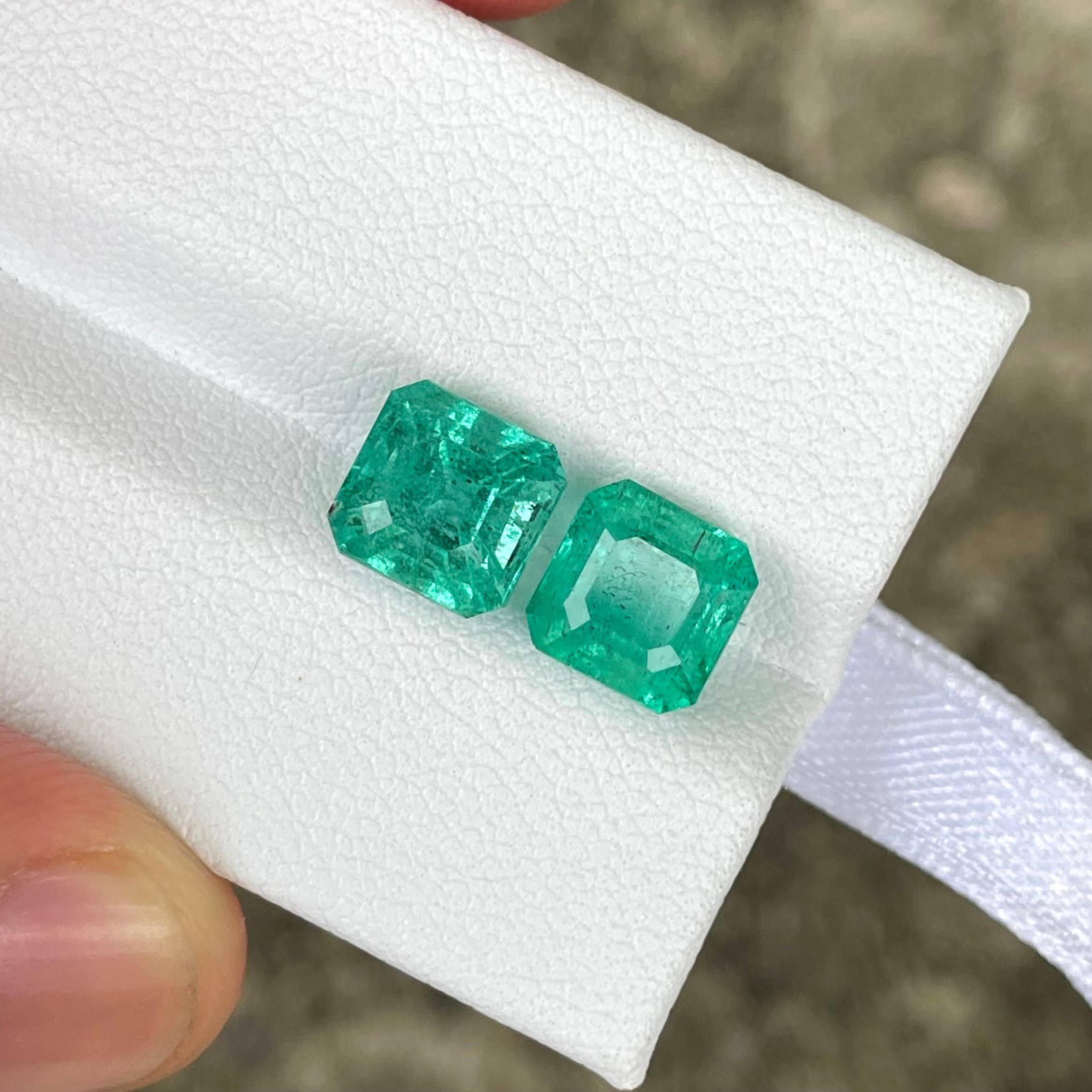 Weight 4.75 carats 
Dimensions 7.3x7.2x6.4 mm
Treatment minor oil 
Origin Zambia 
Clarity SI
Shape octagon 
Cut Asscher 



This exquisite pair of Asscher cut green emeralds, totaling 4.75 carats, showcases the captivating allure of natural Zambian