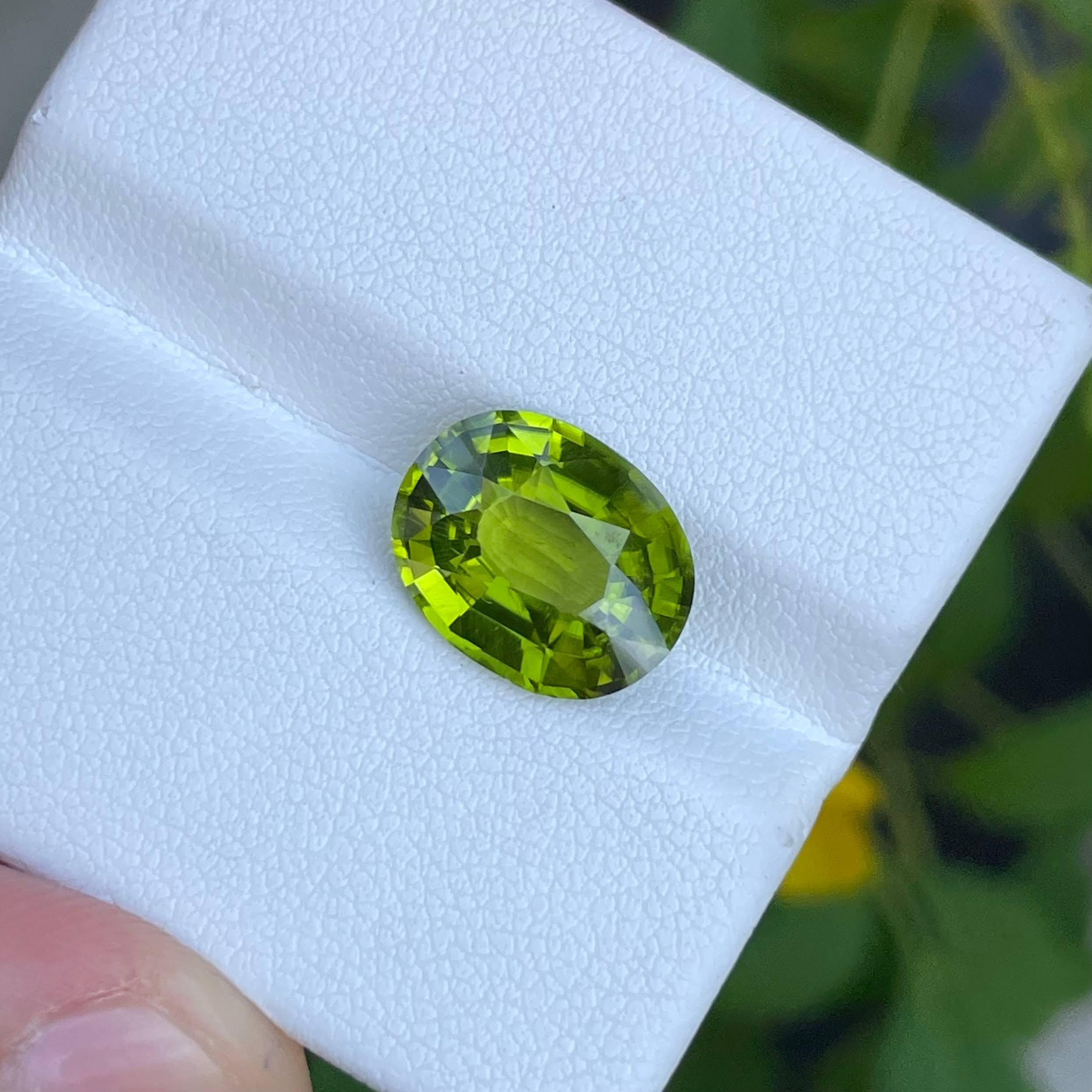 Weight 4.75 carats 
Dimensions 12.4x10.0x5.5 mm
Treatment none 
Origin Pakistan 
Clarity VVS
Shape oval 
Cut oval 




The exquisite beauty of this 4.75 carat Green Peridot Stone is truly captivating, showcasing a Fancy Oval Cut that enhances its
