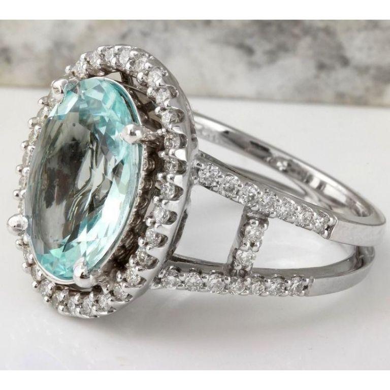 4.75 Carats Natural Aquamarine and Diamond 14K Solid White Gold Ring

Total Natural Oval Cut Aquamarine Weights: 3.75 Carats

Aquamarine Measures: 13.10 x 10.13mm

Natural Round Diamonds Weight: 1.00 Carats (color G / Clarity VS2-SI1)

Ring size: 6