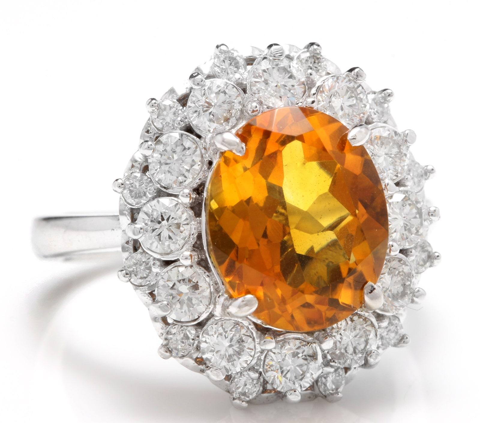 4.75 Carats Exquisite Natural Madeira Citrine and Diamond 14K Solid White Gold Ring

Total Natural Citrine Weight is: Approx. 3.50 Carats

Citrine Measures: Approx. 11.00 x 9.00mm

Natural Round Diamonds Weight: Approx. 1.25 Carats (color G-H /