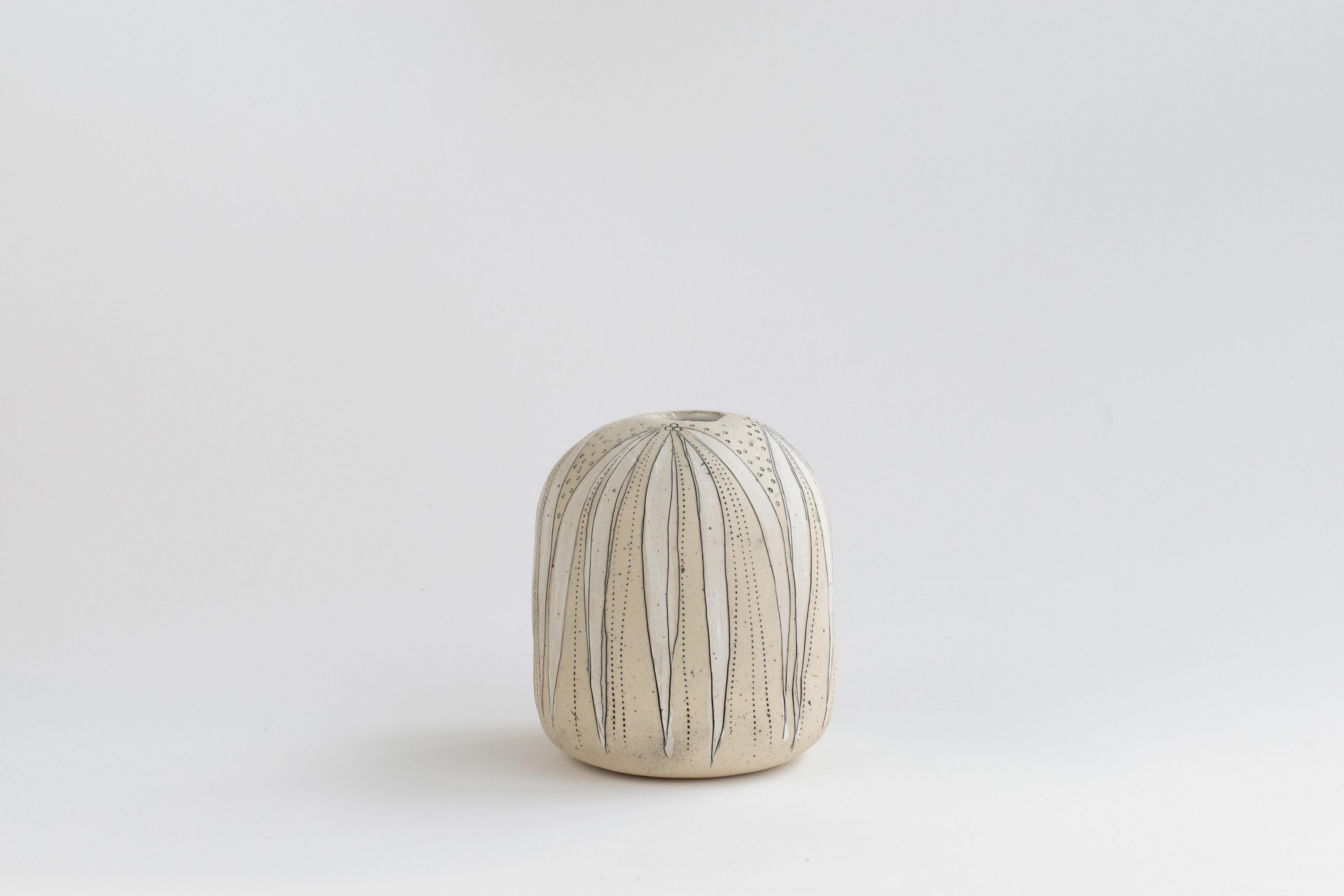 475-G handcrafted stoneware budding vase by Helen Prior


A delicate handcrafted Vase, organic in shape with a torn clay opening in natural speckled stoneware clay.
Part of the Cross Pollination Series- the stylizing and abstraction of elements