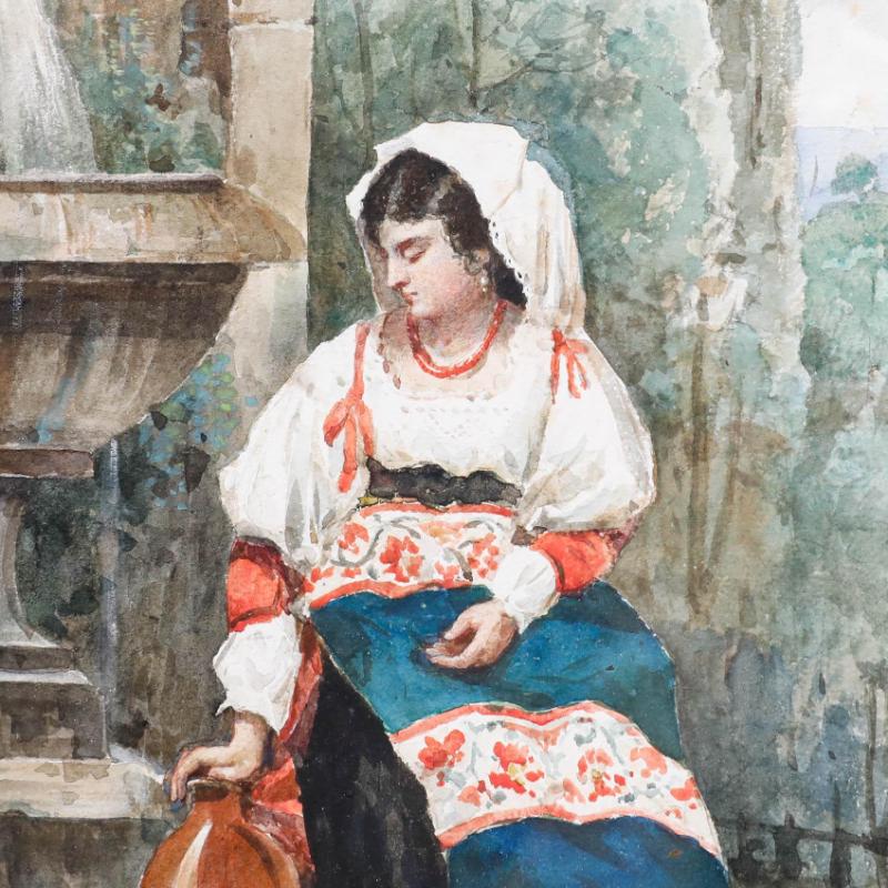 Eine junge Frau sitzt an einem Brunnen, neben ihr steht ein Wasserkrug. Gut präsentiert in einem vergoldeten Rahmen mit einem Washline-Passepartout. Nicht signiert. Auf Aquarellpapier.