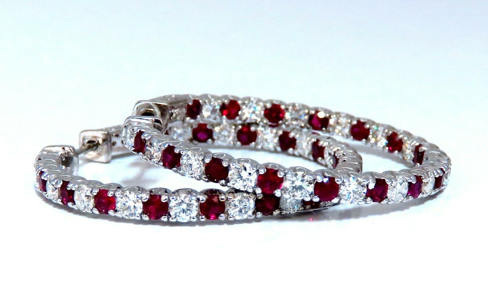 In / Out Hoop Earrings

Rubies, Diamonds Alternated 

2.50ct. Natural Rubies.

Rubies: Rounds, Full Cut.

Transparent & Even Red tone.

Vivid red colors



2.25cts of round diamonds: 

G-color, Vs-2 clarity.

14kt. white gold

12.1 grams.

Earrings