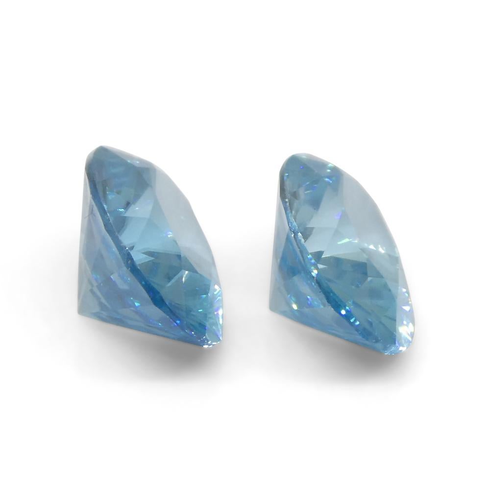 Brilliant Cut 4.75ct Pair Oval Diamond Cut Blue Zircon from Cambodia For Sale