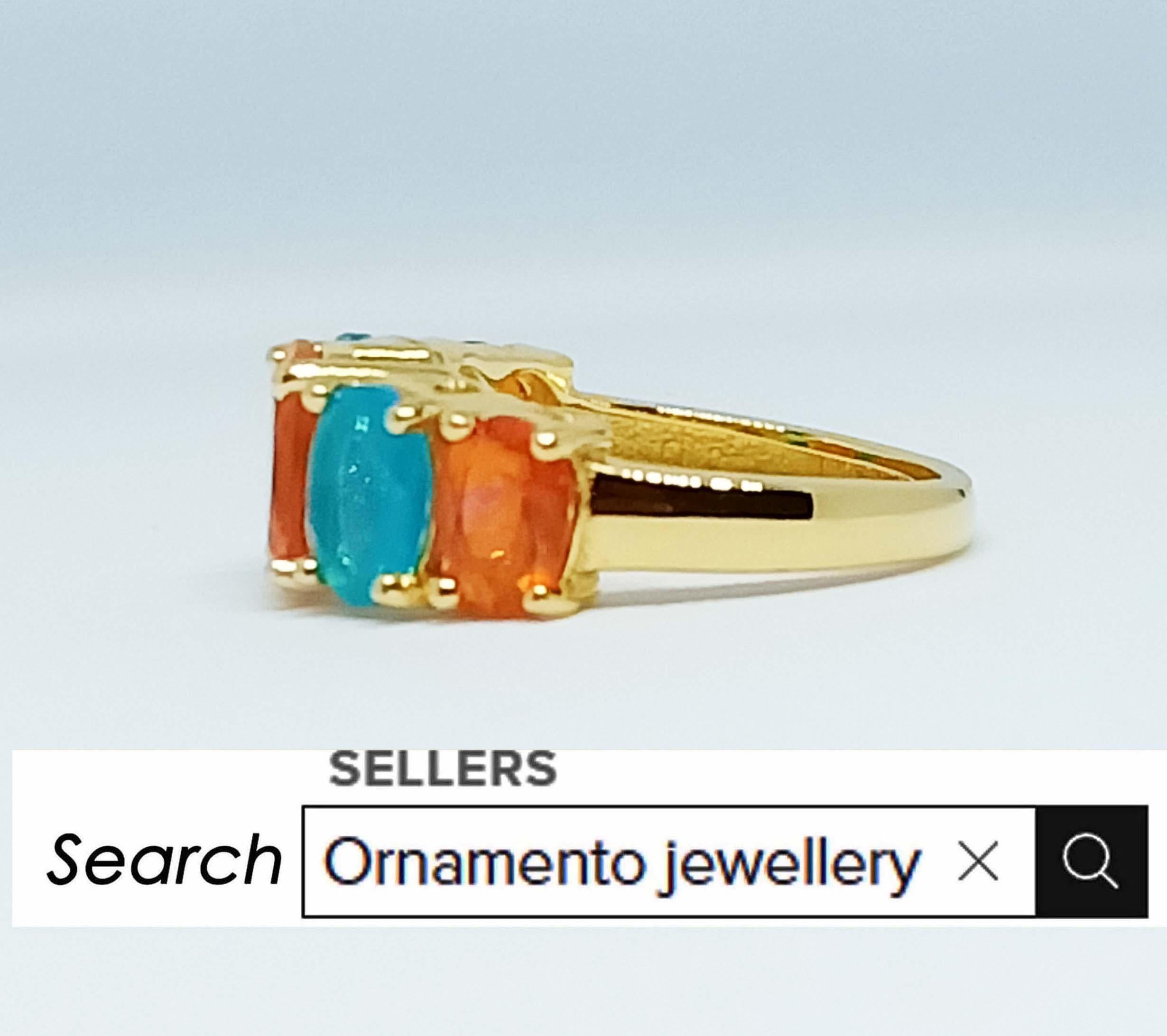 Contemporary 4.75cts. Orange and Blue Opal Ring.Sterling Silver in 18K Gold Plated. For Sale