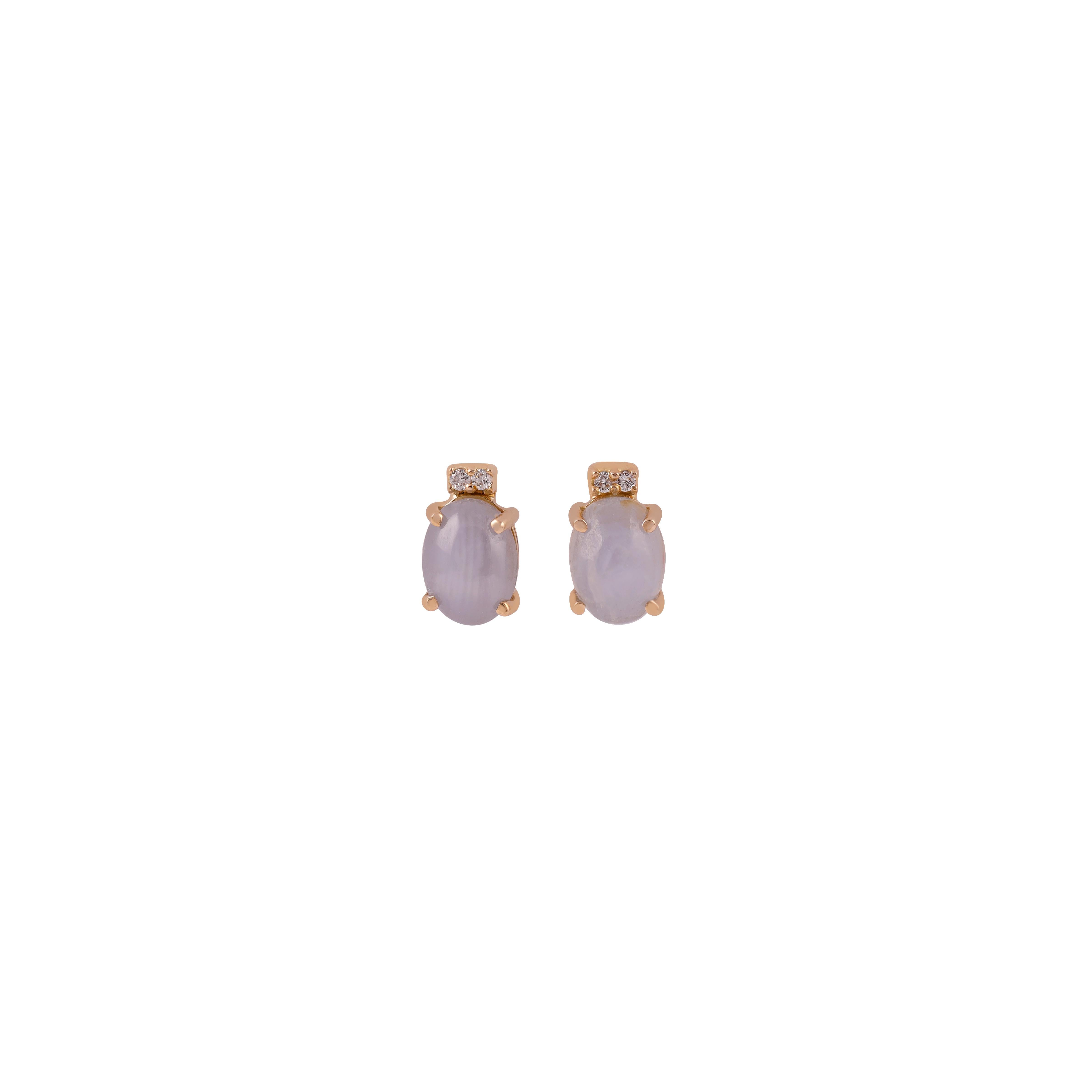 This is an elegant Stud earring pair with  6 Line Star Sapphire  & diamonds feature 1 pieces   6 Line Star Sapphire  weight 4.76 carats, 1pieces of  diamonds weight 0.04 carat , these earrings entirely made in 18K Yellow gold weight 2.41 grams.
