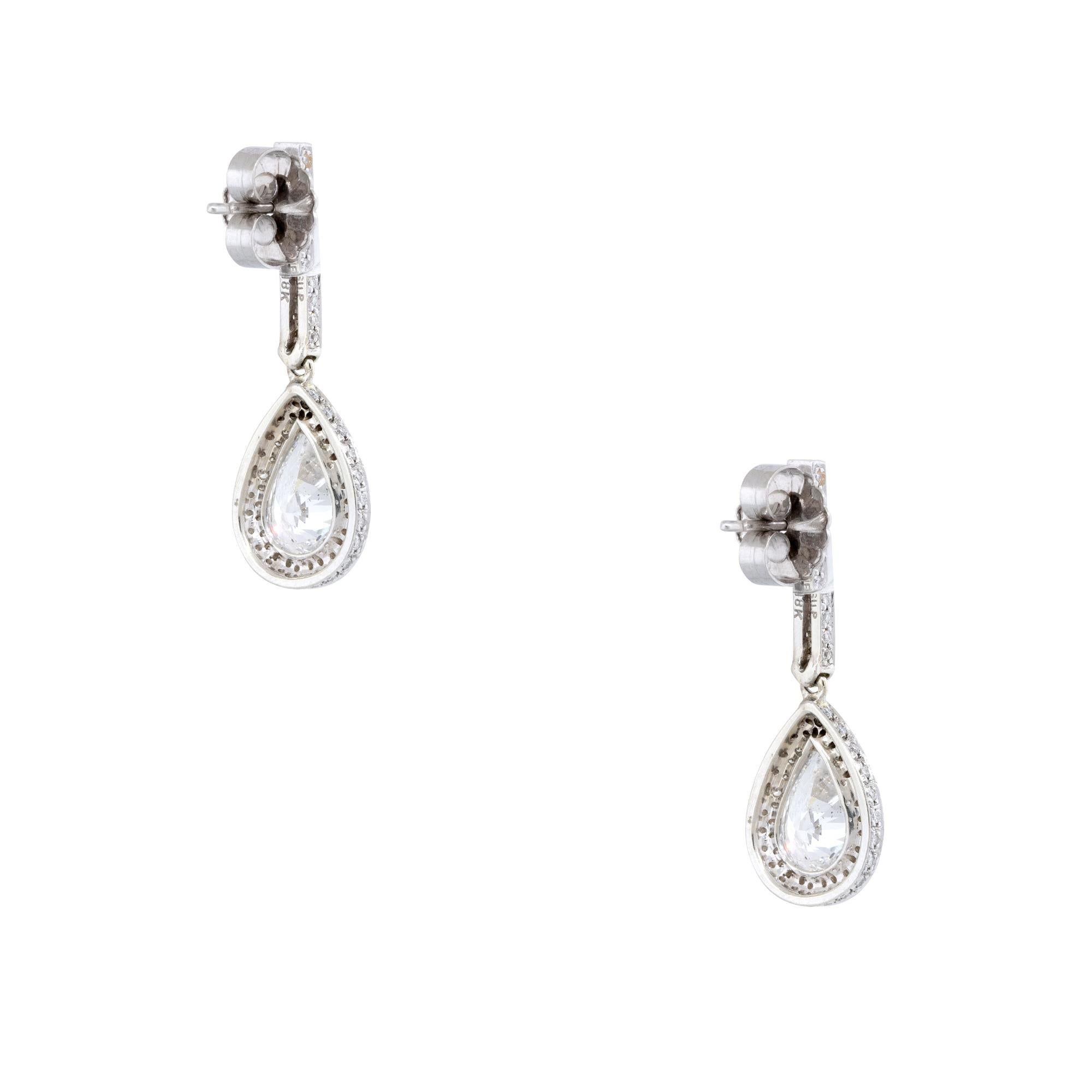 18k White Gold 4.76ctw Pear Shape Halo Drop Earrings
Material	18k White Gold
Diamond Details, Main diamond details: 1, GIA graded, 2 carat, pear shape diamond. F color, SI2 clarity. 1, EGL graded, 2 carat, pear shape diamond. D color, SI2