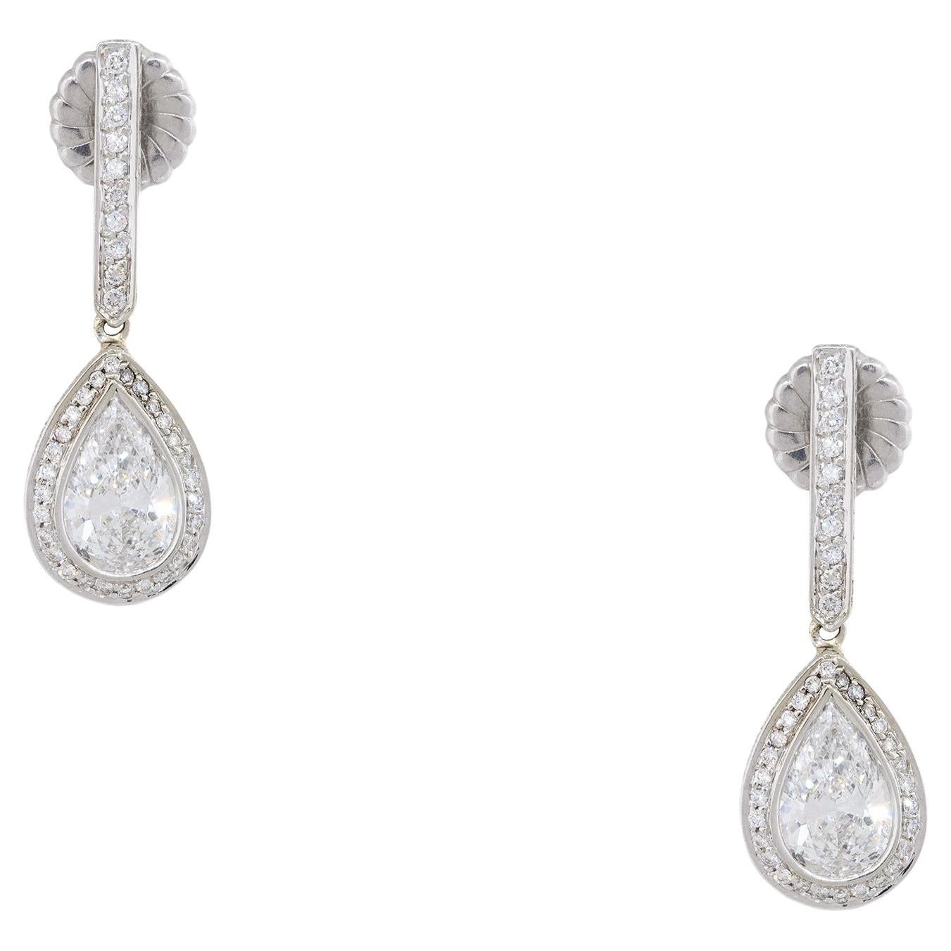 Natural Pear Shape Diamond Halo 18 Karat Drop Earrings In Stock For Sale