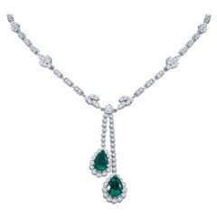 4.76 Carat Pear Shaped Emerald and Diamond Drop Necklace in 18KT White Gold 4.76 Carat Pear Shaped Emerald and Diamond Drop Necklace in 18KT White Gold