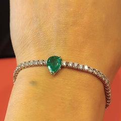 4.76 Carat VS G Diamonds 2.73 Carat Colombian Emerald 18 Carat White Gold Tennis