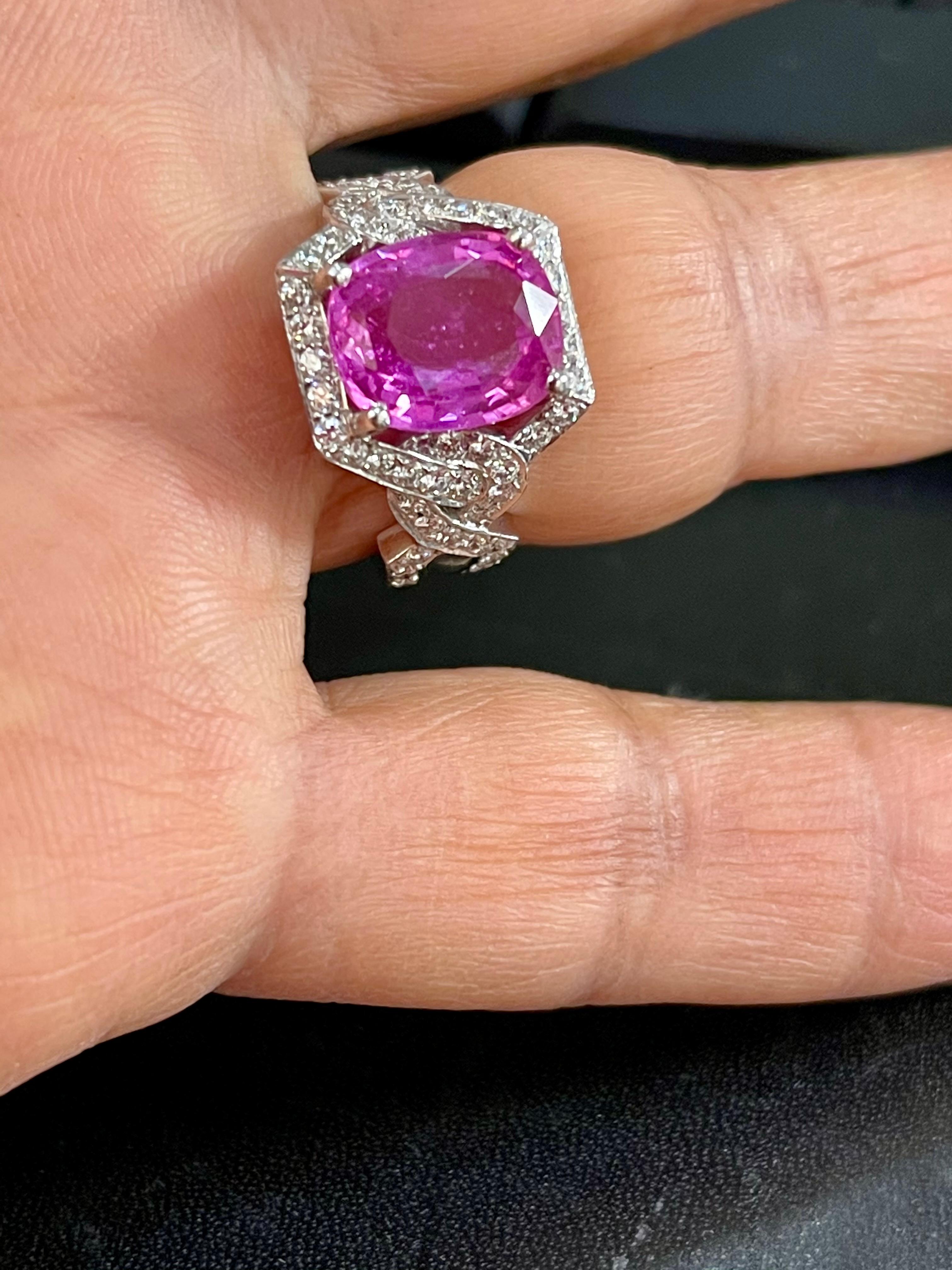 A classic, Ring 
Exact weight of 4.76 Ct natural Pink sapphire and 1.2 ct  Round  Diamond 18 Karat  White gold   Ring
 All round brilliant cut diamonds, Total diamonds 1.2 ct
Natural Pink Sapphire in  cushion shape , Pretty color, luster is amazing