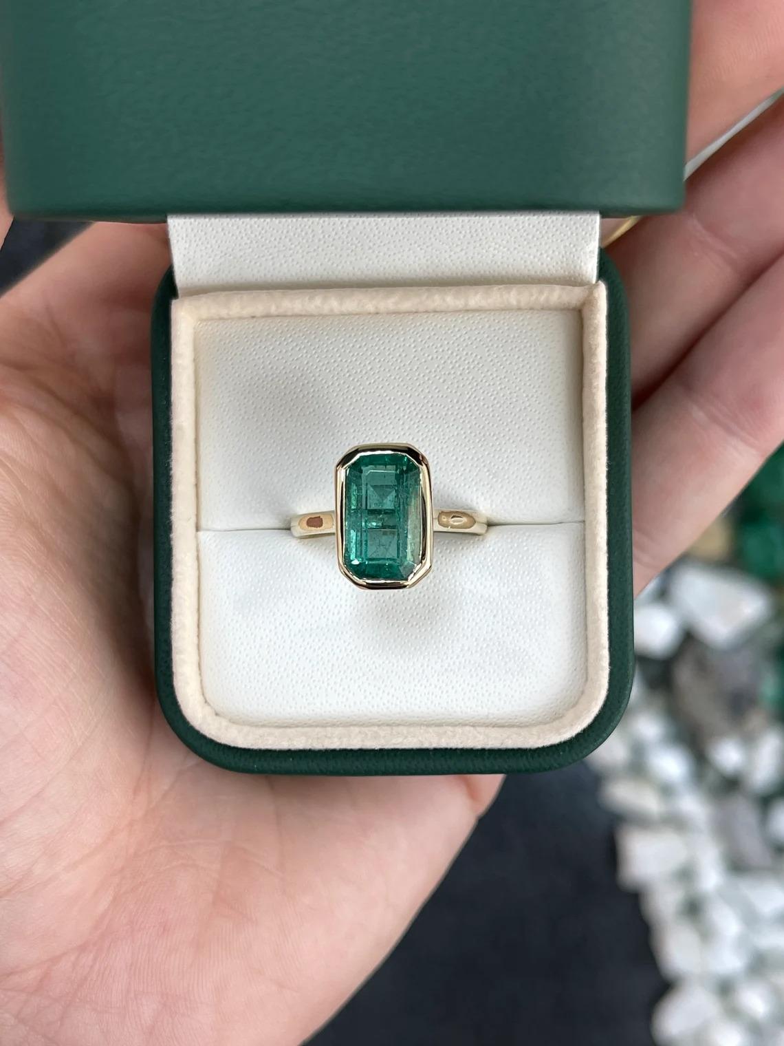 Modern 4.76ct 14K Blue Green Natural Elongated Emerald Cut Emerald Solitaire Bezel Ring For Sale
