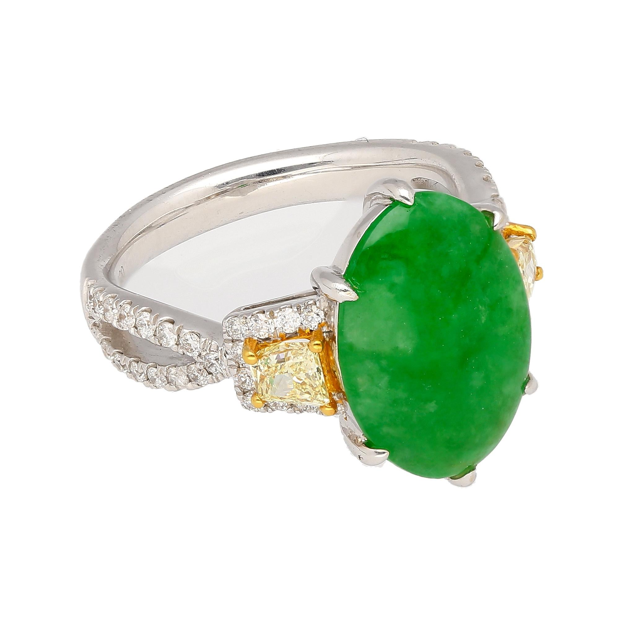 Introducing a rich display of fine jewelry excellence. A multi stone cocktail ring featuring a 4.76 carat Jadeite Jade with Yellow Trapezoid Cut Diamond side stones and a white diamond pave overlapping open ring shank. 

Item Details:
- Type:
