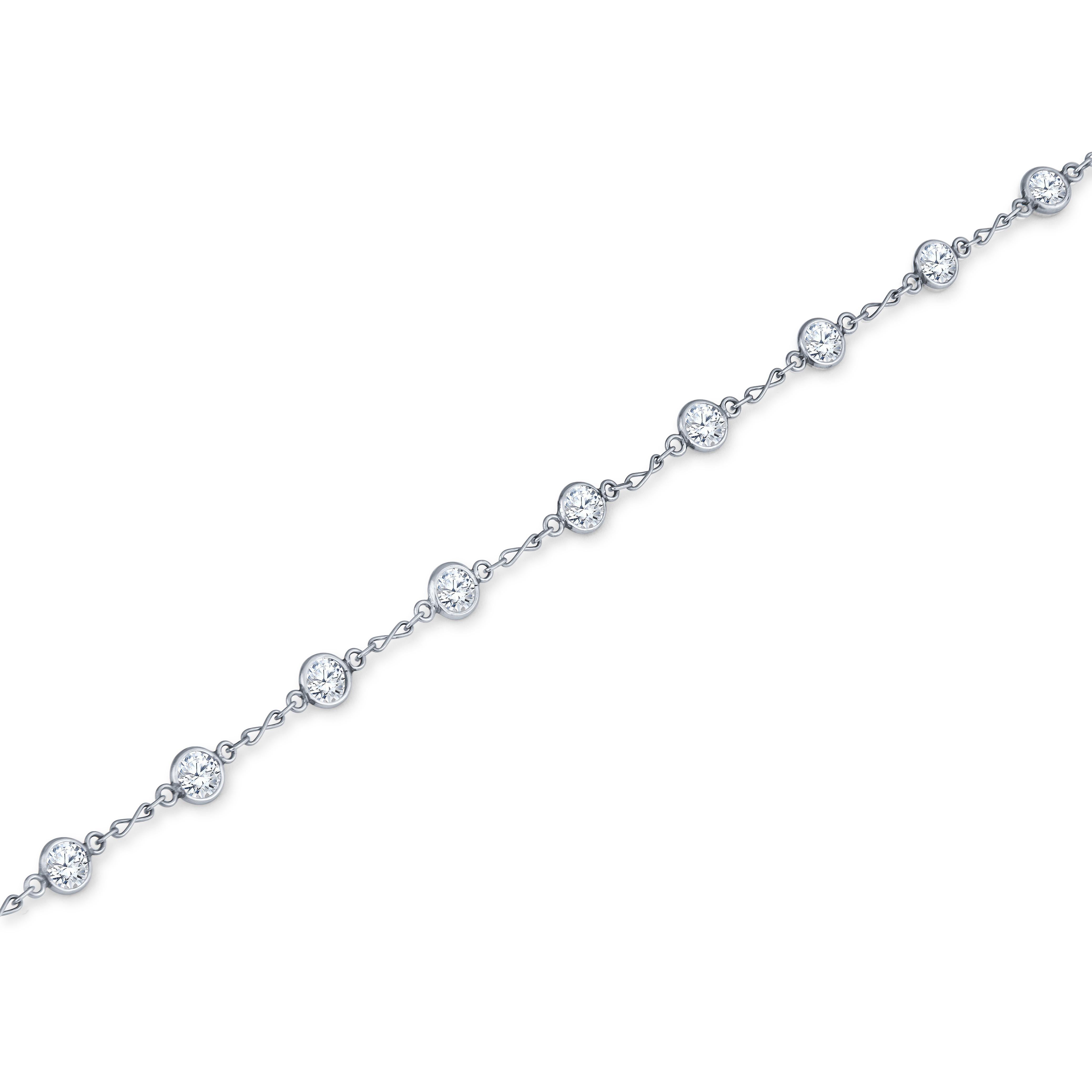 This station necklace is part of our Soft Glamour collection. It features 34 old European cut diamonds that have a 4.76ct total weight, set in a 14kt white gold 19 inch chain. The quality of the diamonds range from G to J in color and VS2 to I1 in