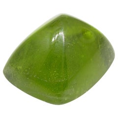 47.7 Carat Cushion Sugarloaf Cabochon Yellowish Green Peridot GIA Certified