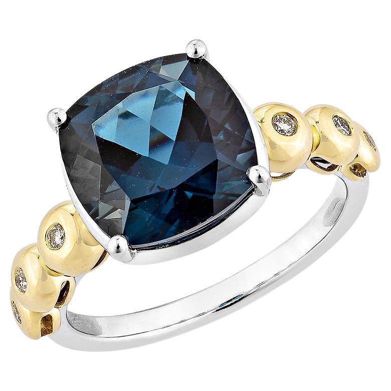 4.77 Carat London Blue Topaz Fancy Ring in 18KWYG with White Diamond. For Sale