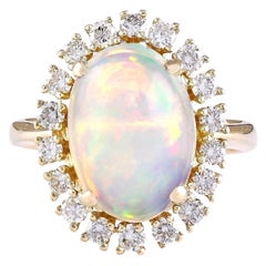 Ring aus 14 Karat Gelbgold mit natürlichem Opal und Diamant