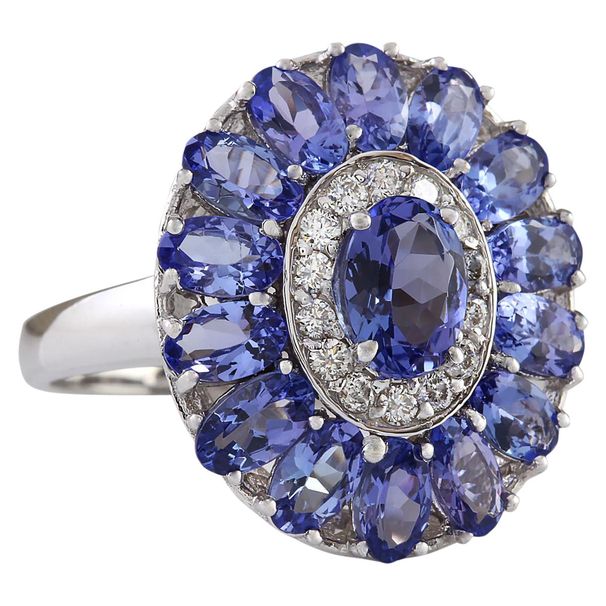 Stamped: 14K White Gold
Total Ring Weight: 5.8 Grams
Total Natural Tanzanite Weight is 4.42 Carat
Color: Blue
Diamond Weight: Total Natural Diamond Weight is 0.35 Carat
Color: F-G, Clarity: VS2-SI1
Face Measures: 20.35x17.40 mm
Sku: [703911W]