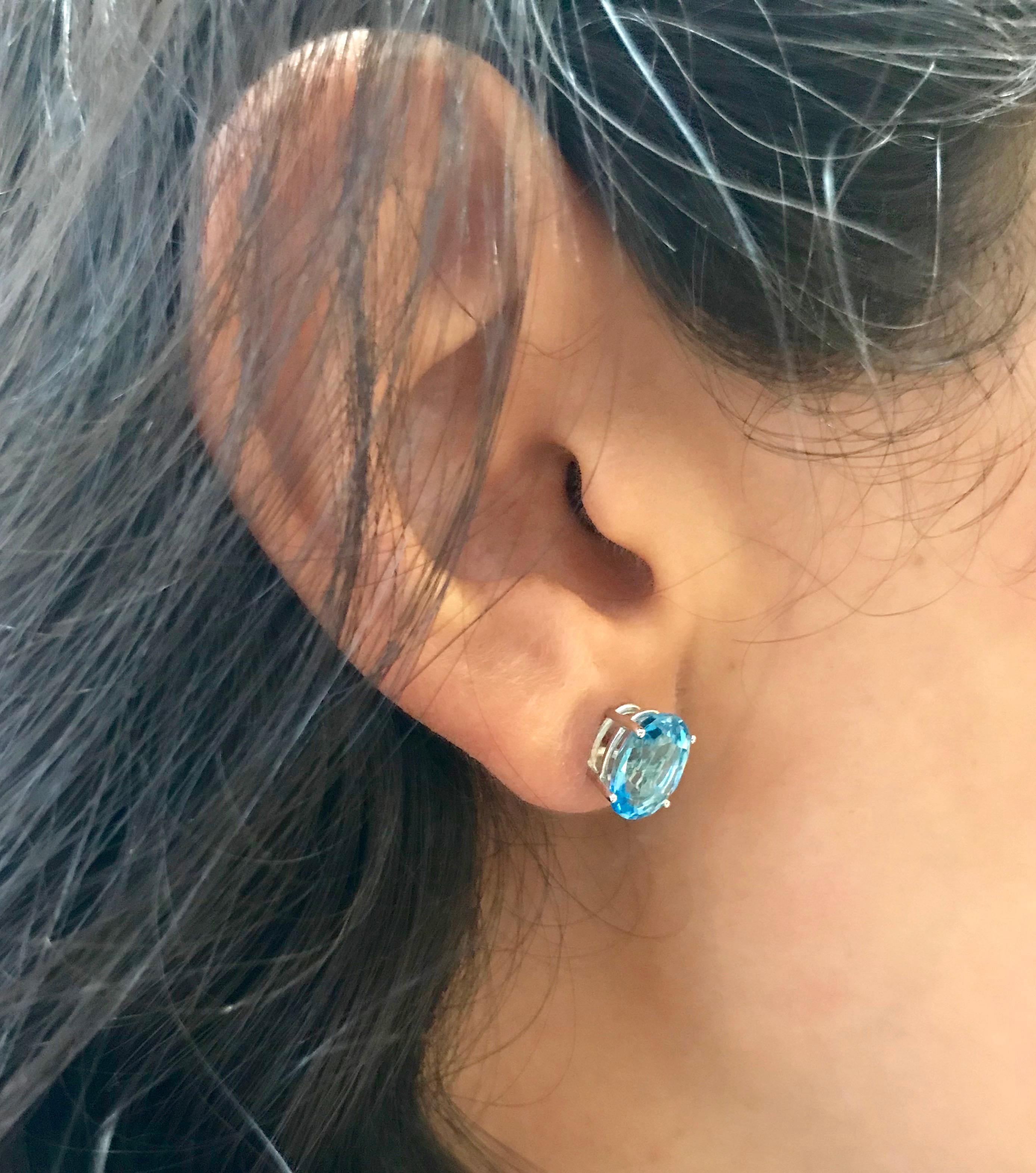Oval Cut 4.77 Carat Oval Blue Topaz Stud Earrings
