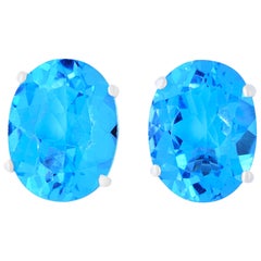 4.77 Carat Oval Blue Topaz Stud Earrings