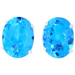 4.77 Carat Oval Blue Topaz Stud Earrings