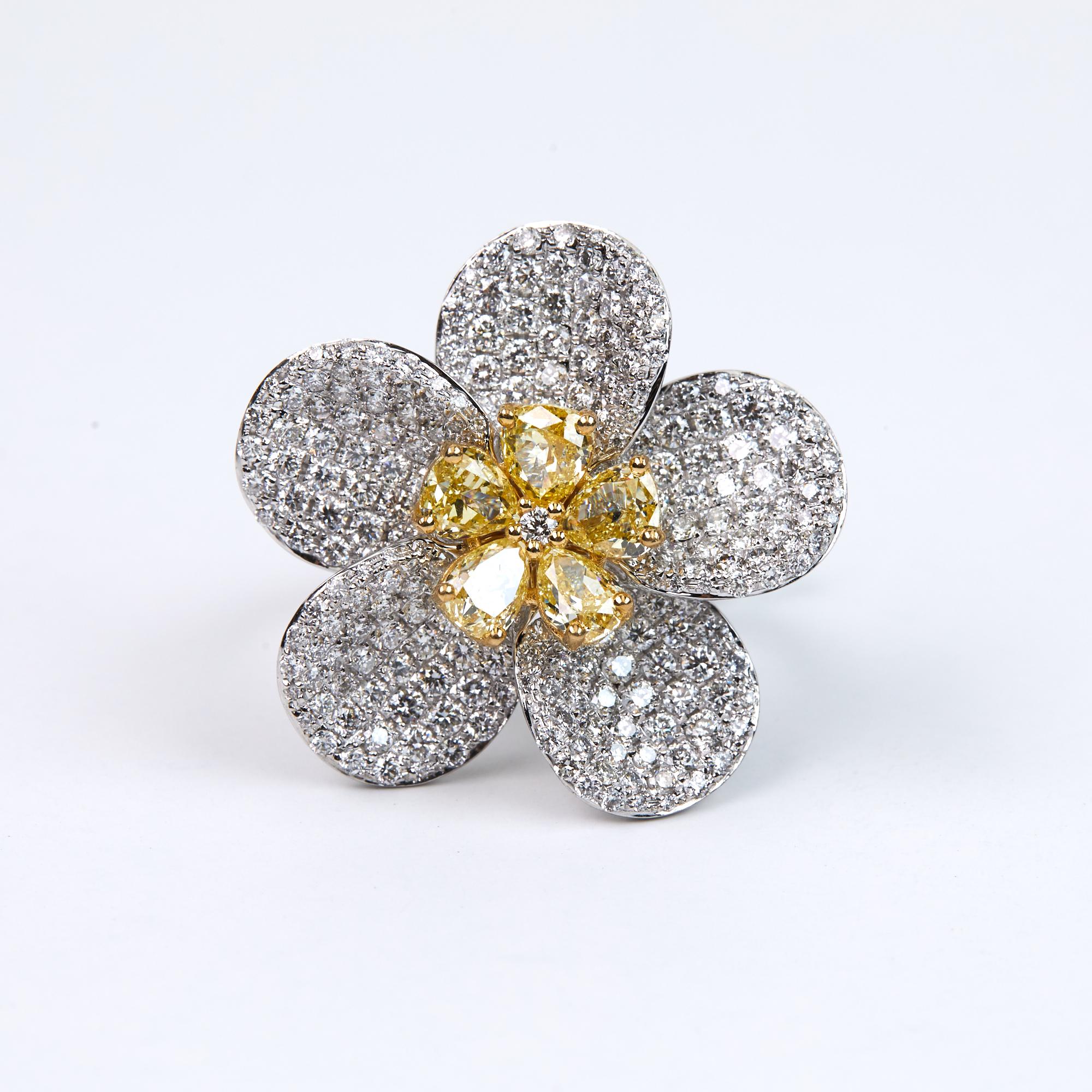 4.77 Carats Diamond Floral Fashion Cocktail Ring.  This one off a kind ring from Joseph Goott Jewelry Collection has 2.22 carats of Fancy Yellow Pear Shaped Diamonds prong set and 2.55 carats of White, Brilliant Round cut Diamonds Pavé set into 18