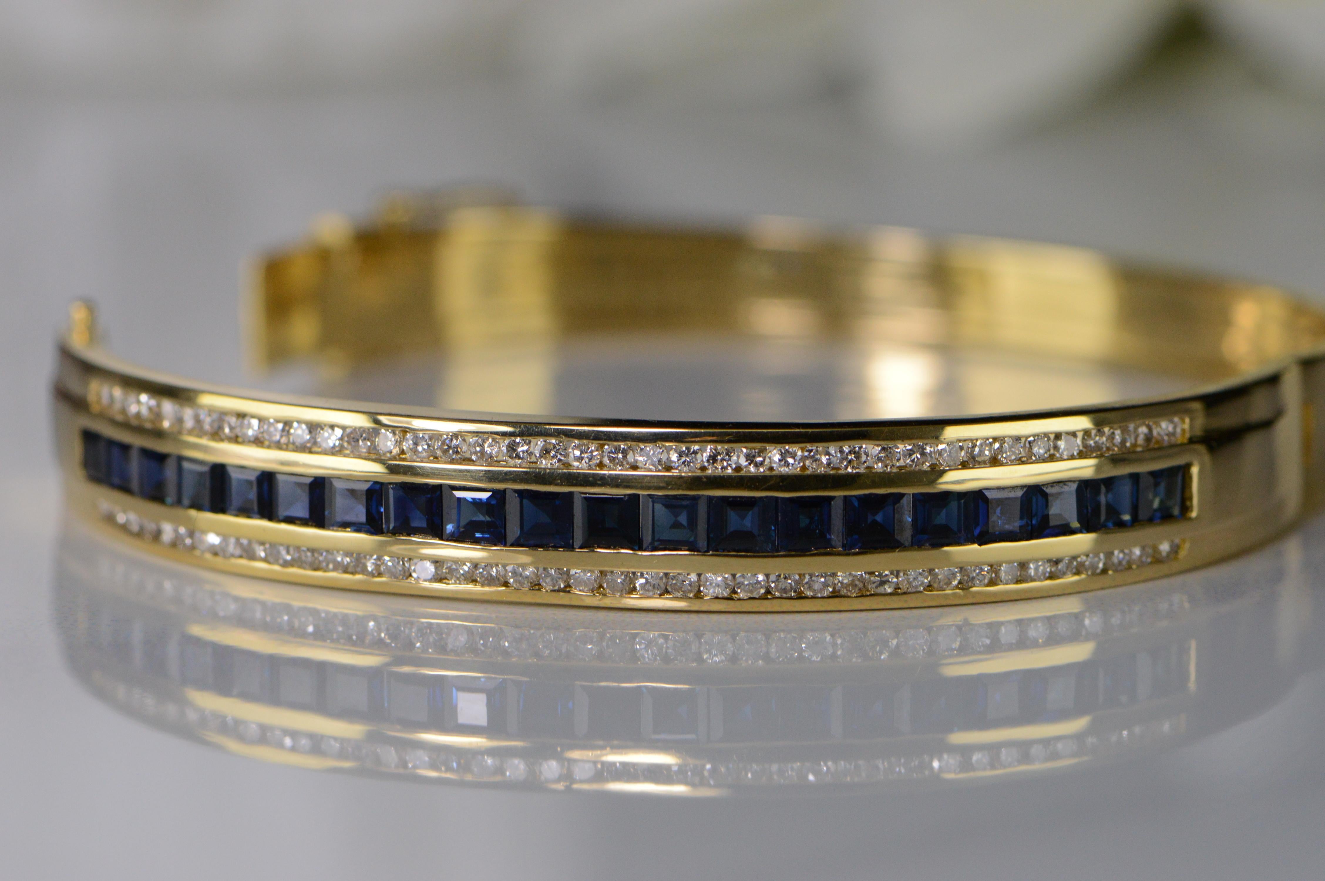 All diamonds are graded according to GIA grading standards.  
·Item: 18K 4.77 Ctw Sapphire Diamond Bangle Hinged Bracelet 2.35