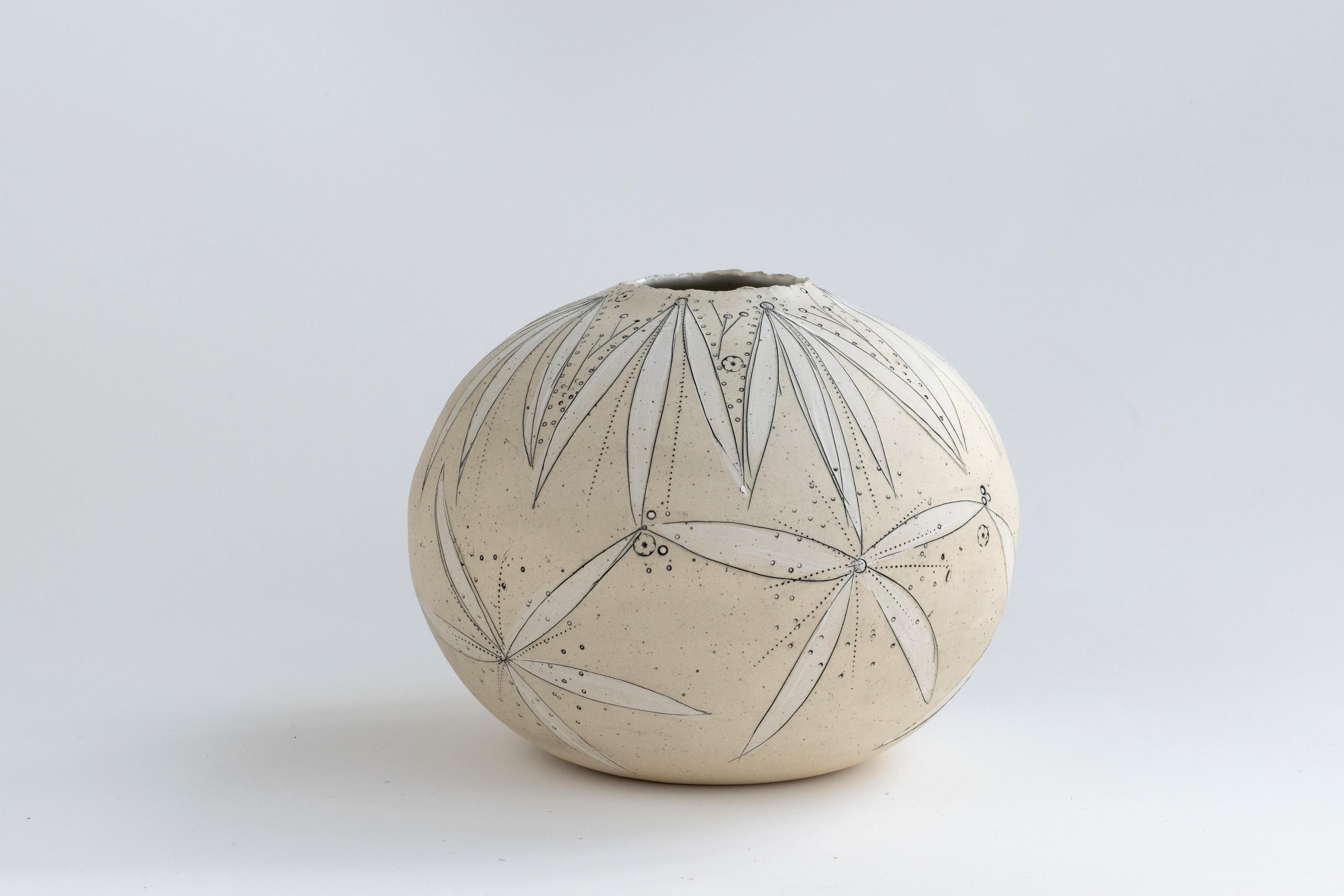 477 Handcrafted stoneware blossoming moon vase by Helen Prior.

A delicate handcrafted vase, organic in shape with a torn clay opening in natural speckled stoneware clay.
Part of the Cross Pollination Series- the stylizing and abstraction of
