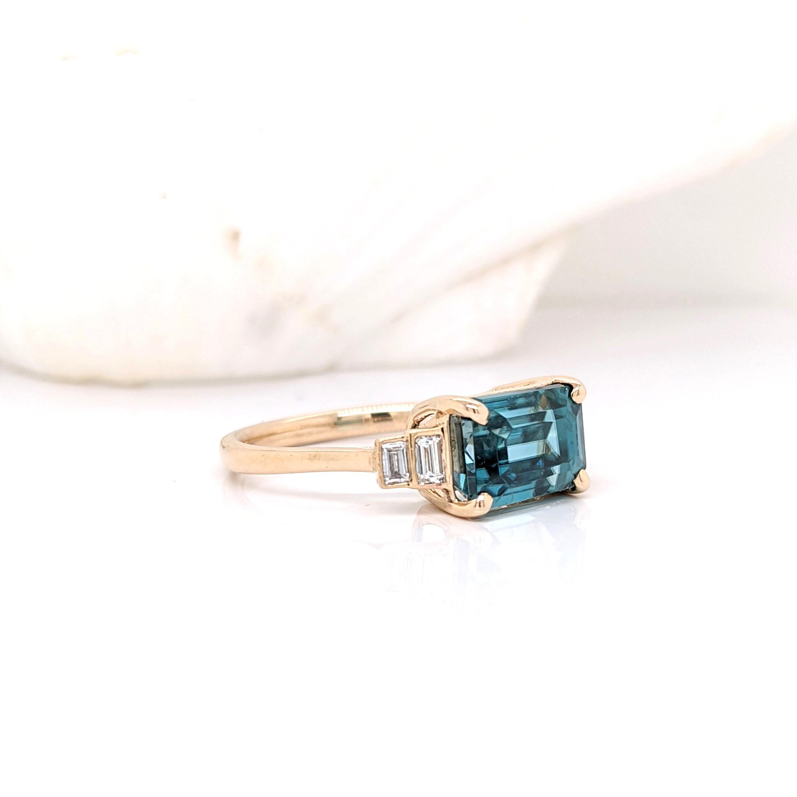 Specifications

Stone : Blue Zircon
Origin : Cambodia
Hardness : 7.5
Treatment : Heated
Shape : Emerald Cut
Size : 9x6.5mm
Weight : 4.77cts
Metal : 14k/2.38gms
Diamonds SI/GH : 0.21cts

Sku: AJR709/2593

As listed, this ring is ready to ship. If