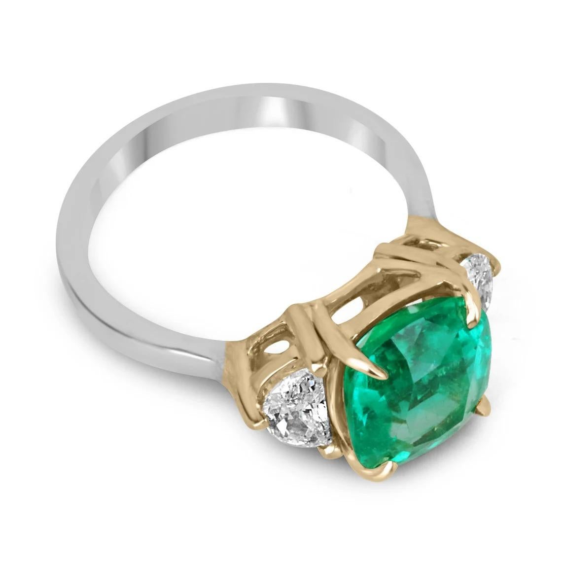 An investment-grade Colombian emerald and half-moon diamond engagement, statement, or right-hand ring. Dexterously crafted in gleaming 18K two-toned gold, this ring features a natural Colombian emerald cushion cut from the famous Muzo mines. Set in