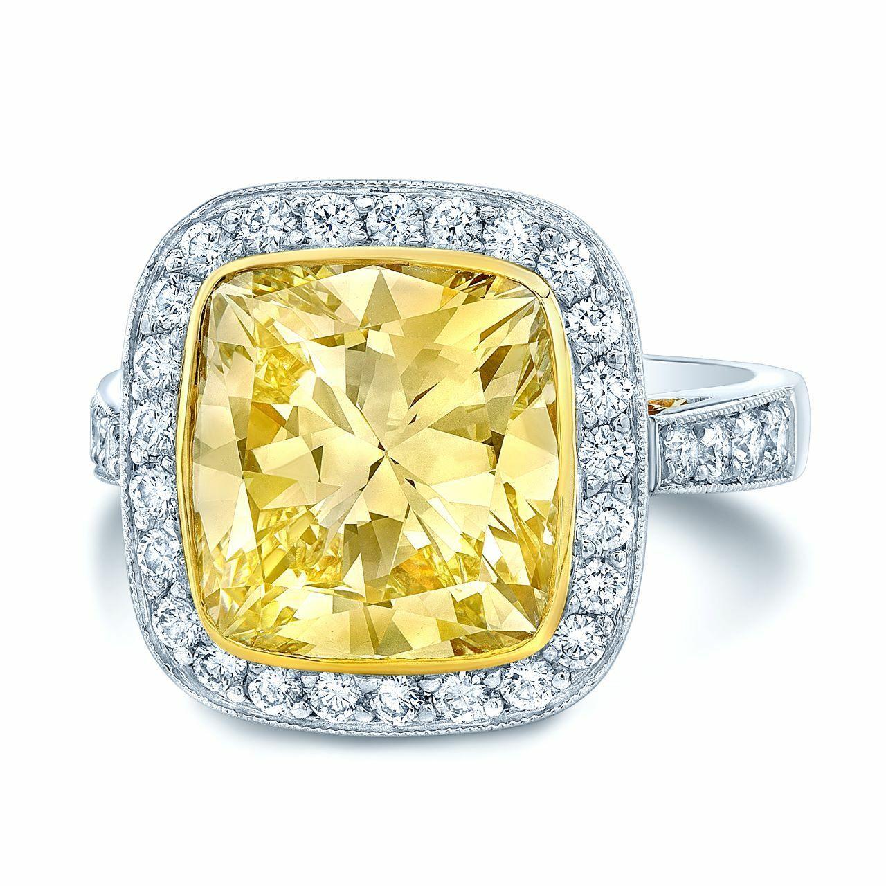 Round Cut 4.78 Carat Light Fancy Yellow Platinum and 18 Karat Yellow Gold Engagement Ring For Sale