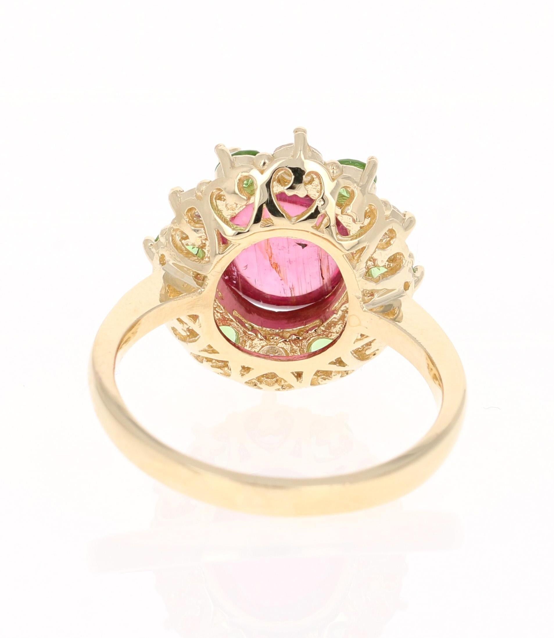 Oval Cut 4.78 Carat Pink Tourmaline Tsavorite Diamond 14 Karat Yellow Gold Ring