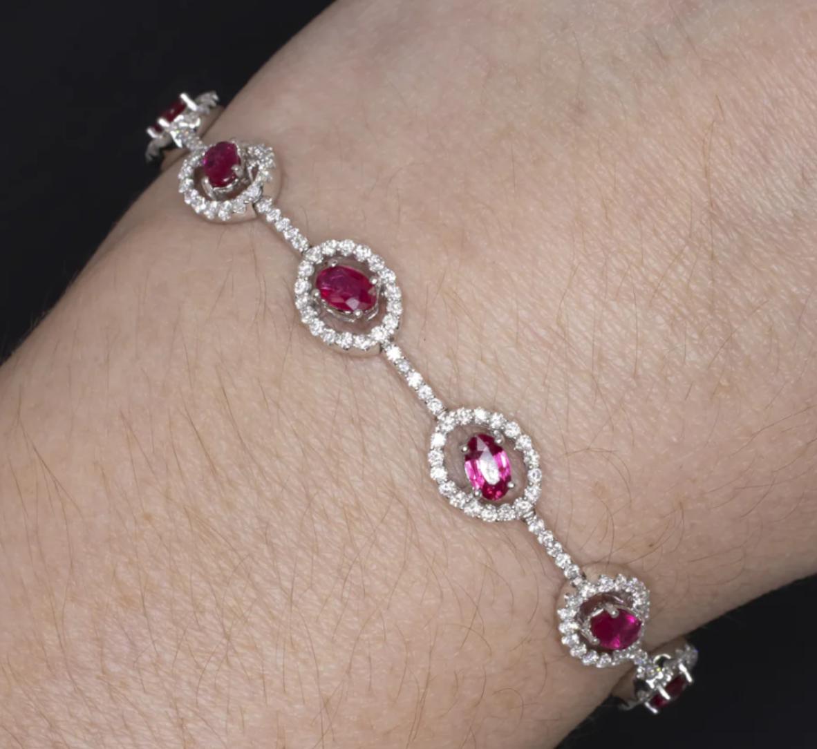 Contemporary 4.78 Carat Ruby and Diamond Bracelet in 18K White Gold Oval Cut Rubies in Halo For Sale