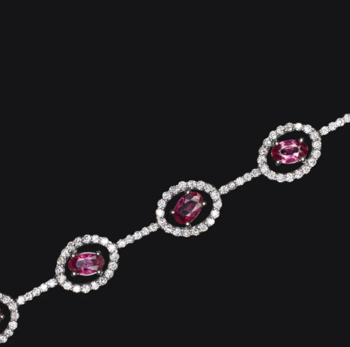 4.78 Carat Ruby and Diamond Bracelet in 18K White Gold Oval Cut Rubies in Halo In New Condition For Sale In Chicago, IL