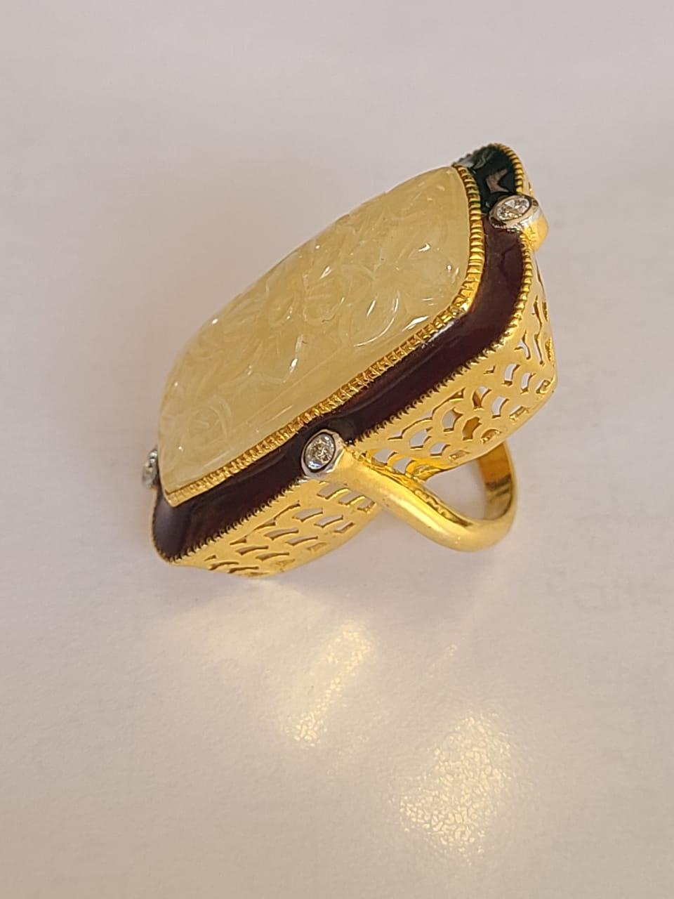 Cabochon 47.80 Carat Yellow Sapphire Ring Set in 18 Karat Gold with Diamond and Enamel