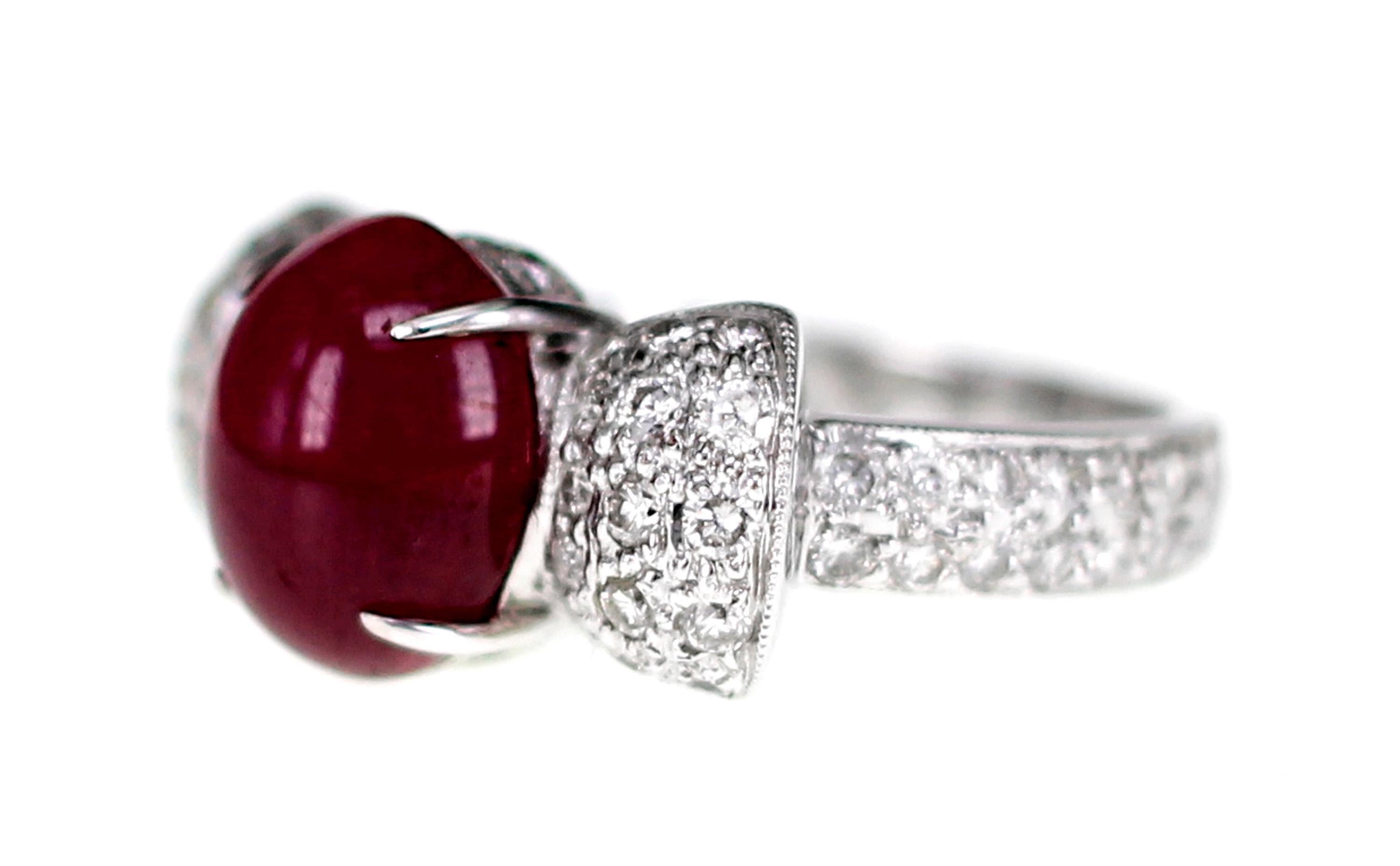 A 4.79 carat ruby is surrounded by a carat of white brilliant white diamond. This elegant ring can be worn for all occasions.  The Ruby used is in cabochon cut which was very popular in the 1800's. Now the trend is fast catching up, thus making this