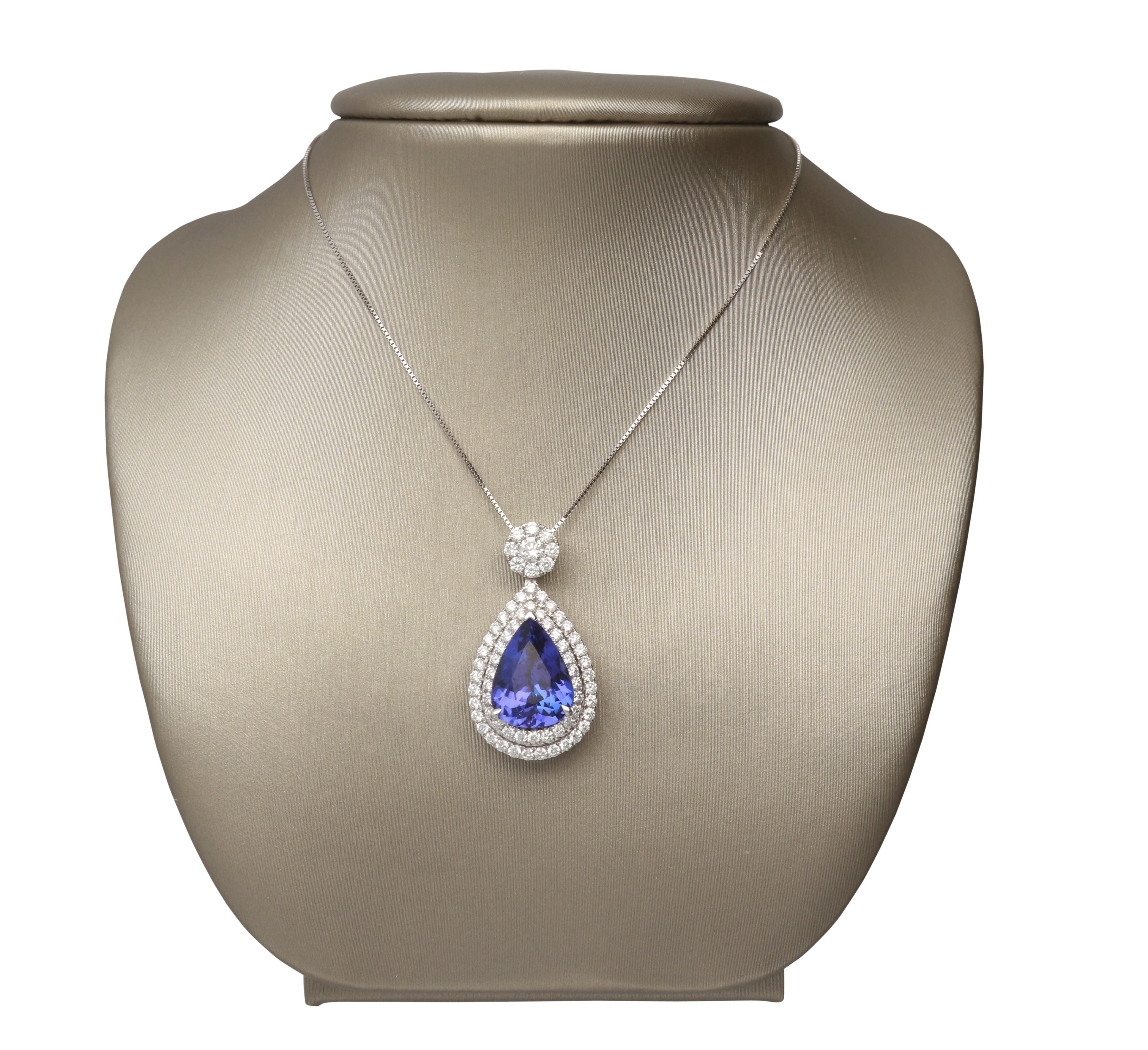 Featuring this beautiful Gin and Grace Pendant, crafted in 18-karat White Gold and features a pear shaped Tanzanite 4.79 Carat, 1 Round Brilliant cut Diamond 0.10 Carat & 67 Round Brilliant cut Diamonds 0.95 Carat. This necklace comes with 18' Box