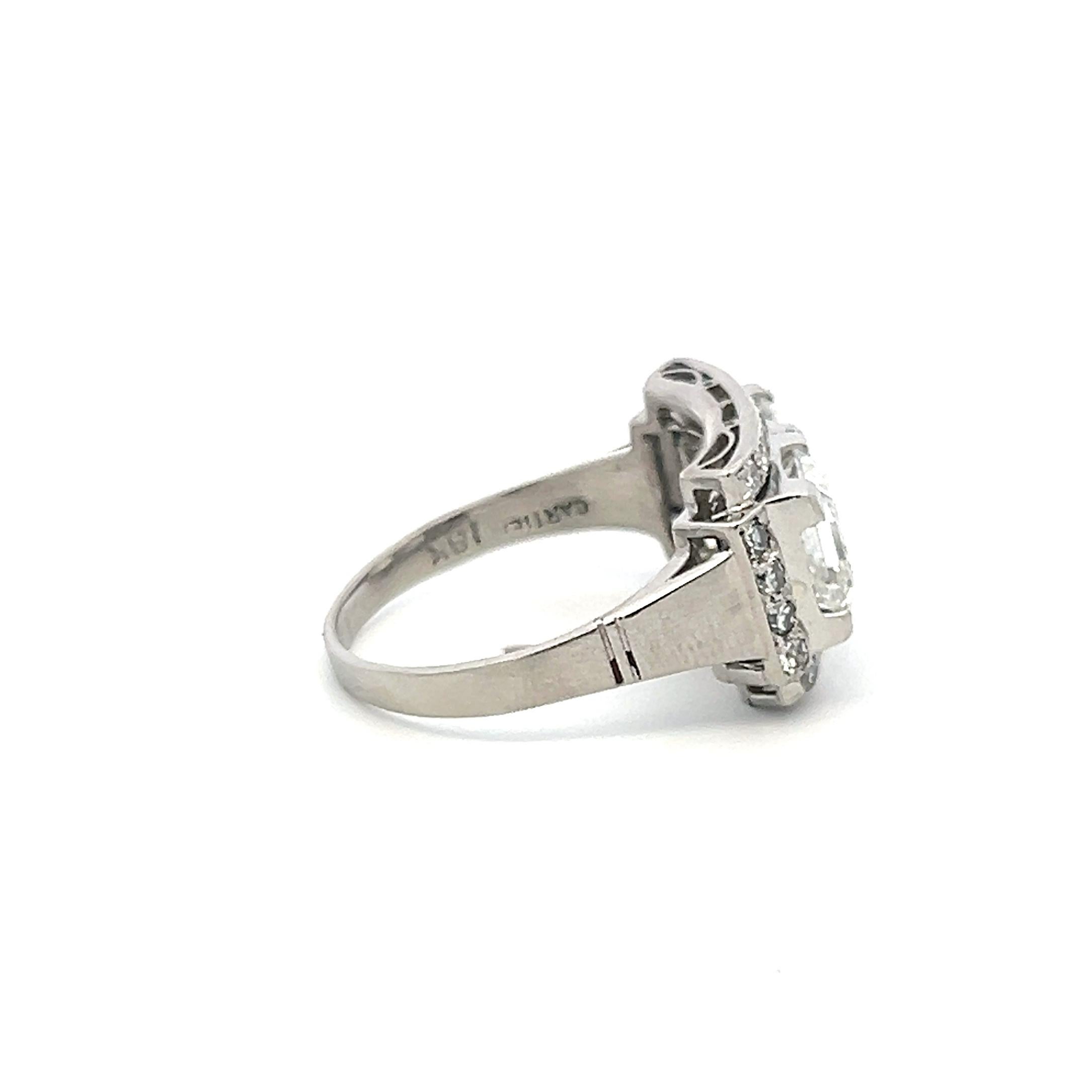 Titre :
Cette remarquable bague d'inspiration Art déco est ornée de deux diamants de taille Asscher certifiés GIA totalisant 4,27 carats, complétés par un halo de fins diamants ronds de taille brillant. Fabriquée à la main par des experts en or