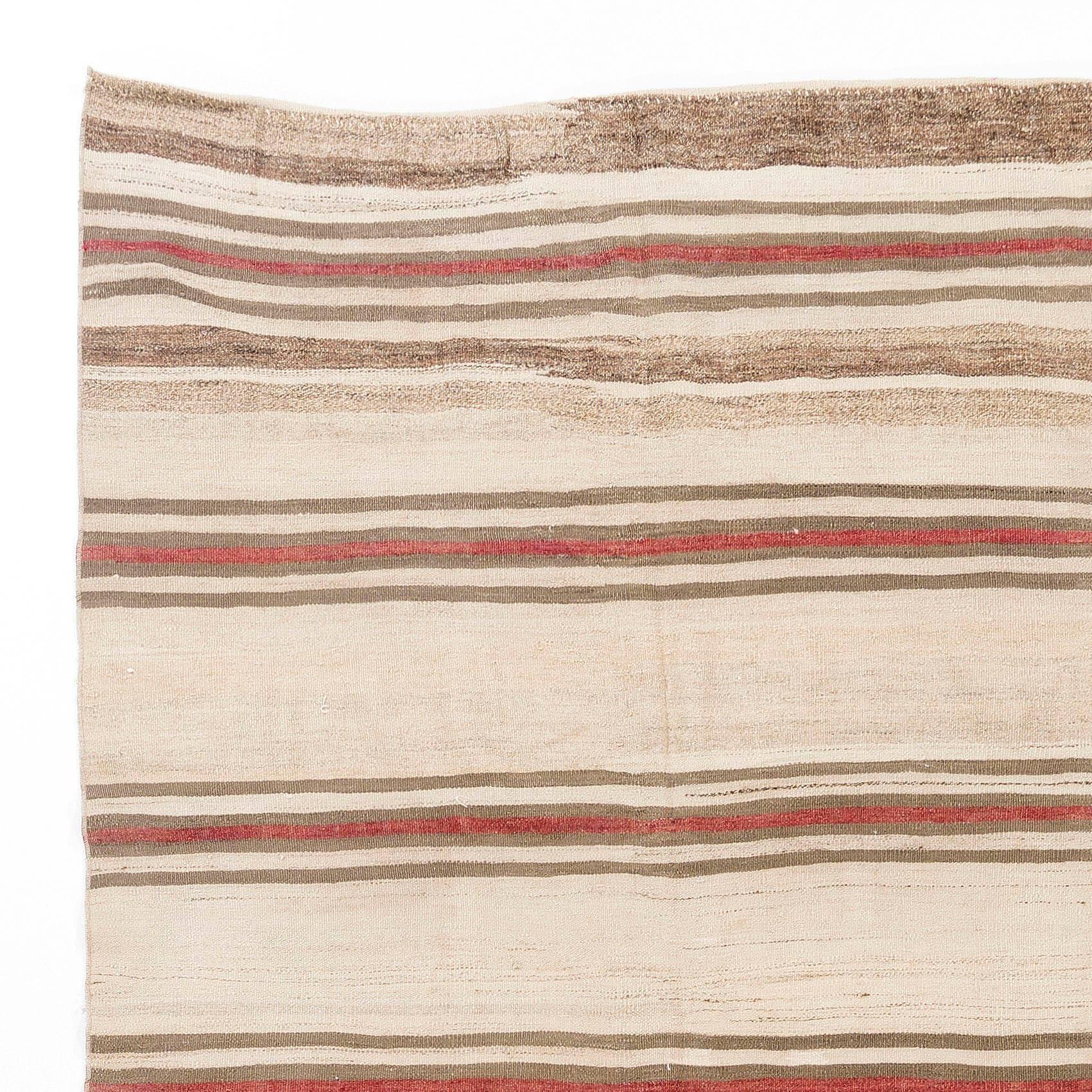 This beautiful and simple flat-woven rug is made of natural un-dyed wool in various shades of brown and beige with a touch of madder dyed terracotta red. Measures: 4.7 x 12 Ft.
We can modify the dimensions if requested, i.e. make it shorter and/or