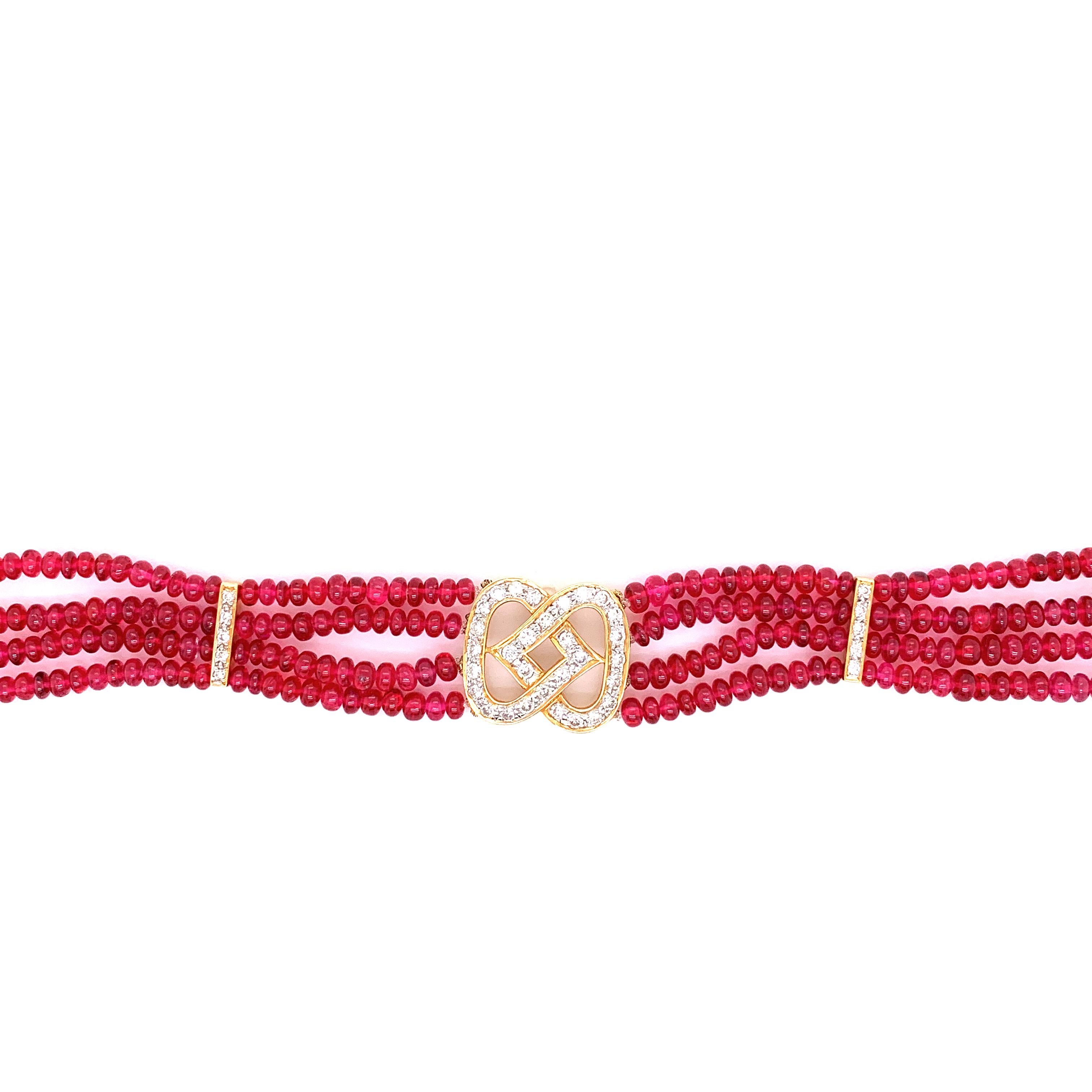 48 Carat Burmese Red Spinel Beads and White Diamond Gold Bracelet :

A very elegant bracelet, it features natural unheated vivid red spinel beads from Burma weighing 48 carat as well as a beautiful diamond clasp along two diamond bars situated on
