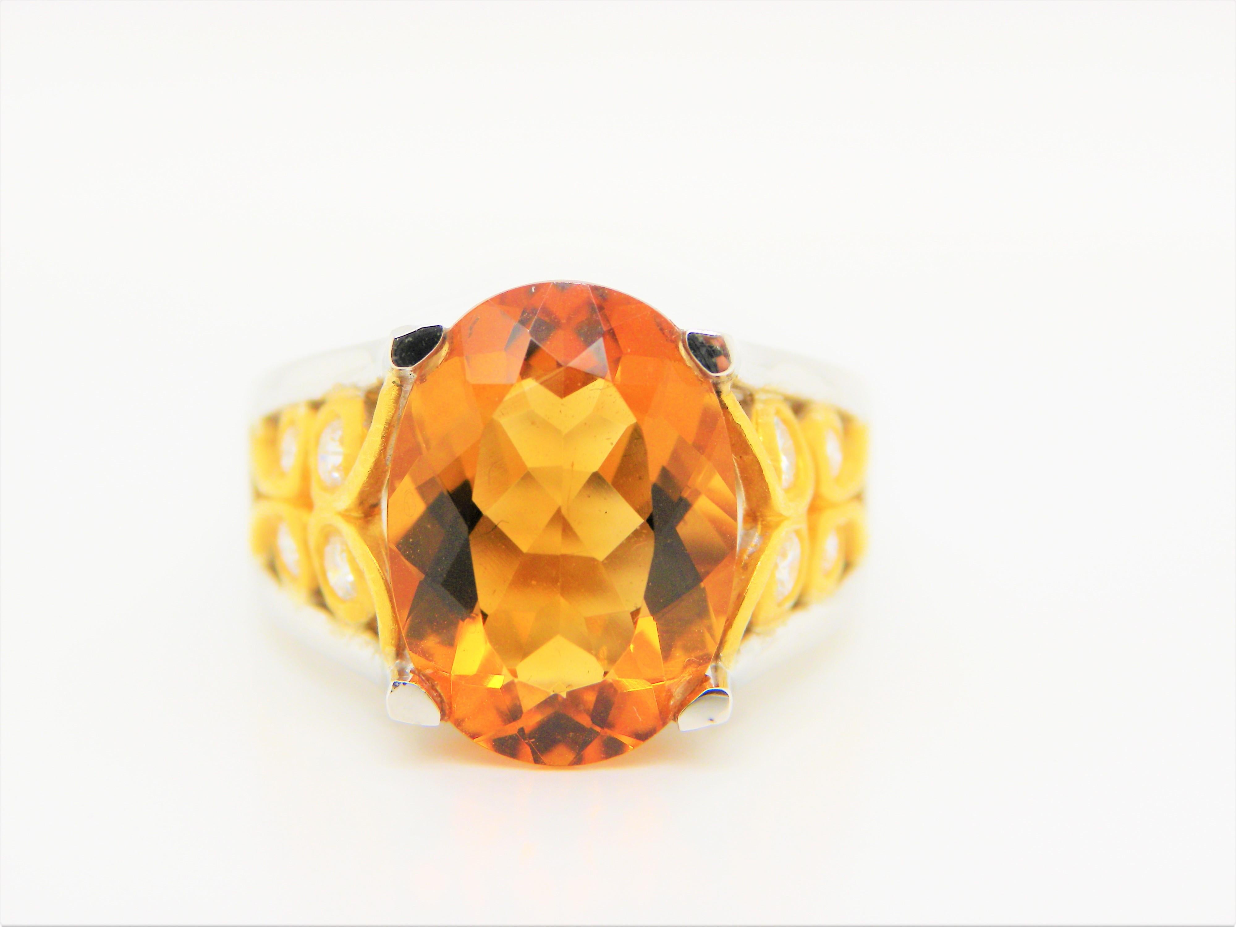 4.8 Carat Citrine And Diamond Gold Cocktail Ring:

A gorgeous looking Art-Deco inspired Citrine and Diamond Ring, perfect for cocktail events and dinner parties! The vivid orangey-brown Citrine weighs 4.8 carat, with flawless clarity and excellent