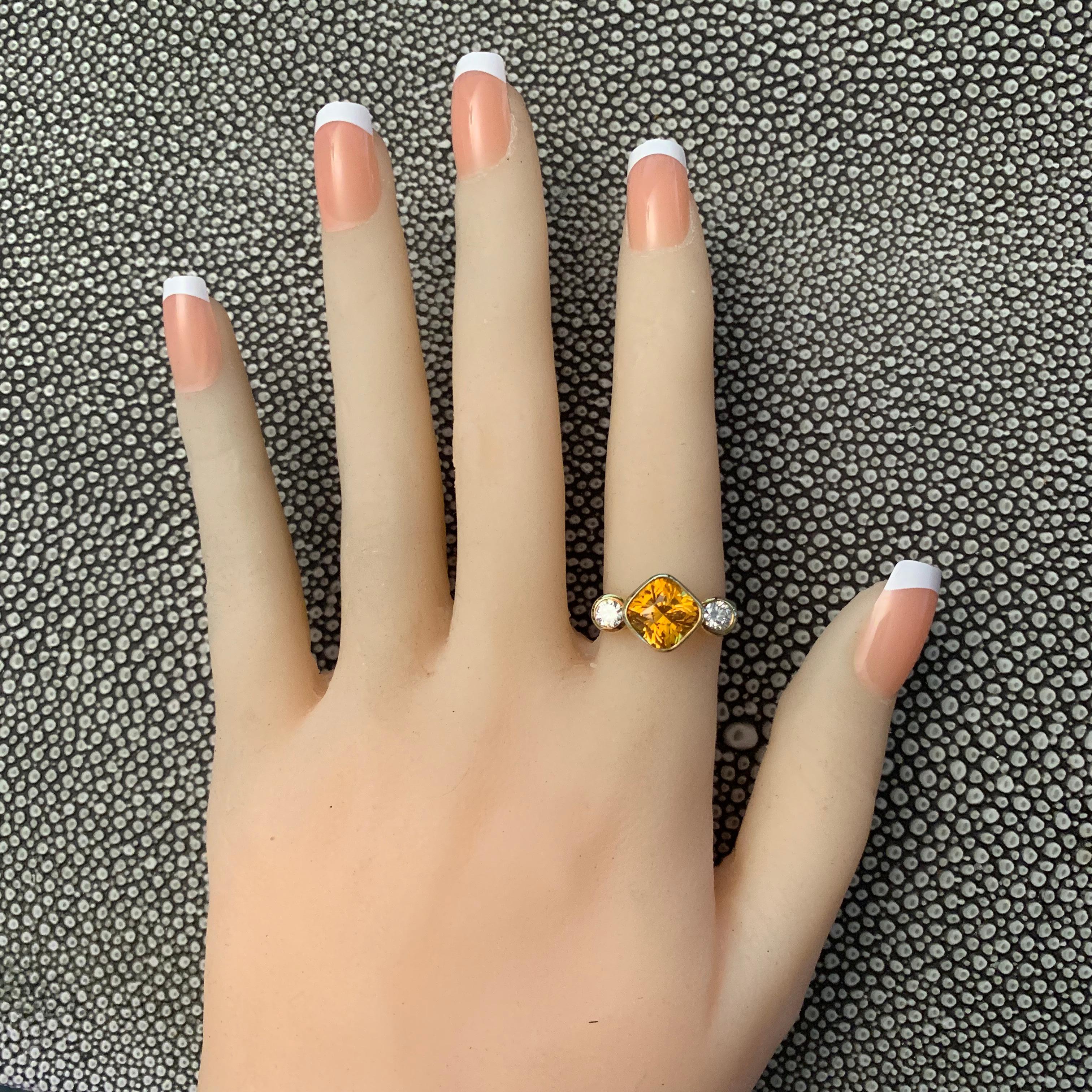 Center Stone Details: 
Carat : 4.32 
Color: Yellow- Orange
Shape: Square Cushion
Treatment- Heated
Clarity: Eye Clean


Setting  Details:
Metal: 18k K Yellow
Stones: Diamond
Shape: Round
Carat Weight: 0.52 Ct apprx





