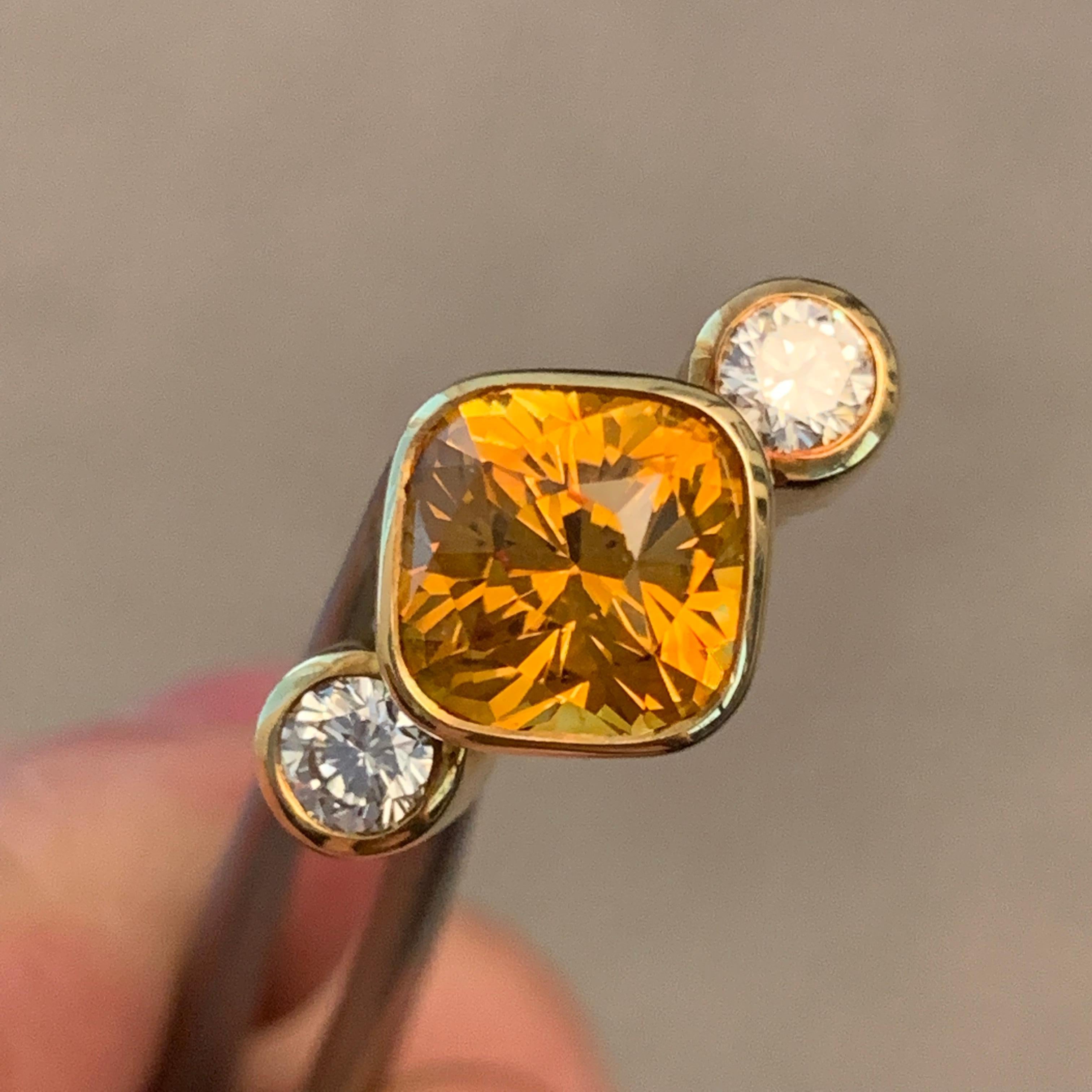 Cushion Cut 4.8 Carat Yellow-Orange Sapphire and Diamond Ring, Ben Dannie For Sale