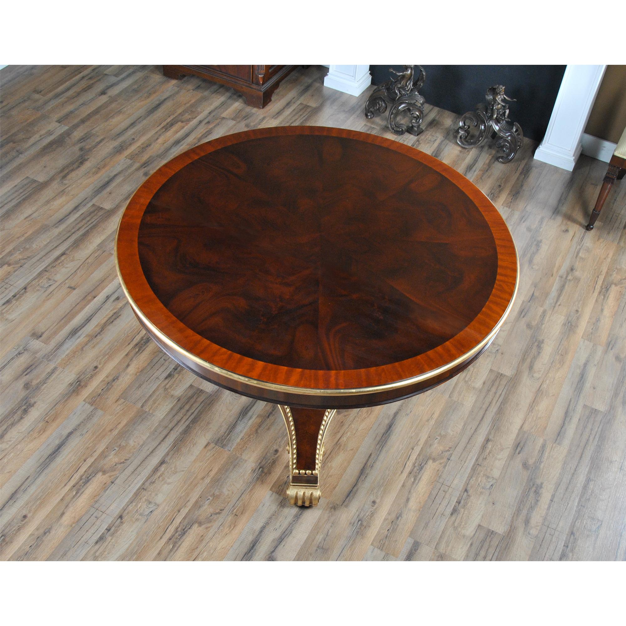 This 48 inch Round Dining Table is a great size to fit into many dining rooms and it can also fit well into the large entrance ways in many homes as well. A fantastic base with solid mahogany legs connects through the platform to the carved and