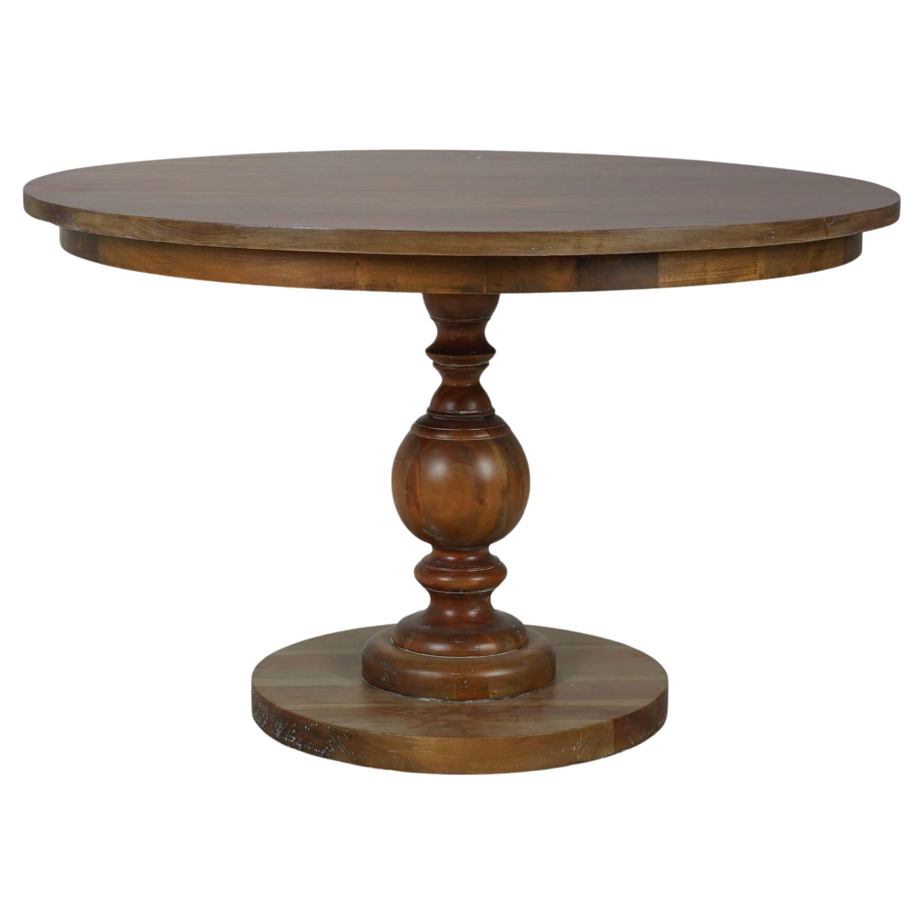 How many people can sit at a 48 inch round table?