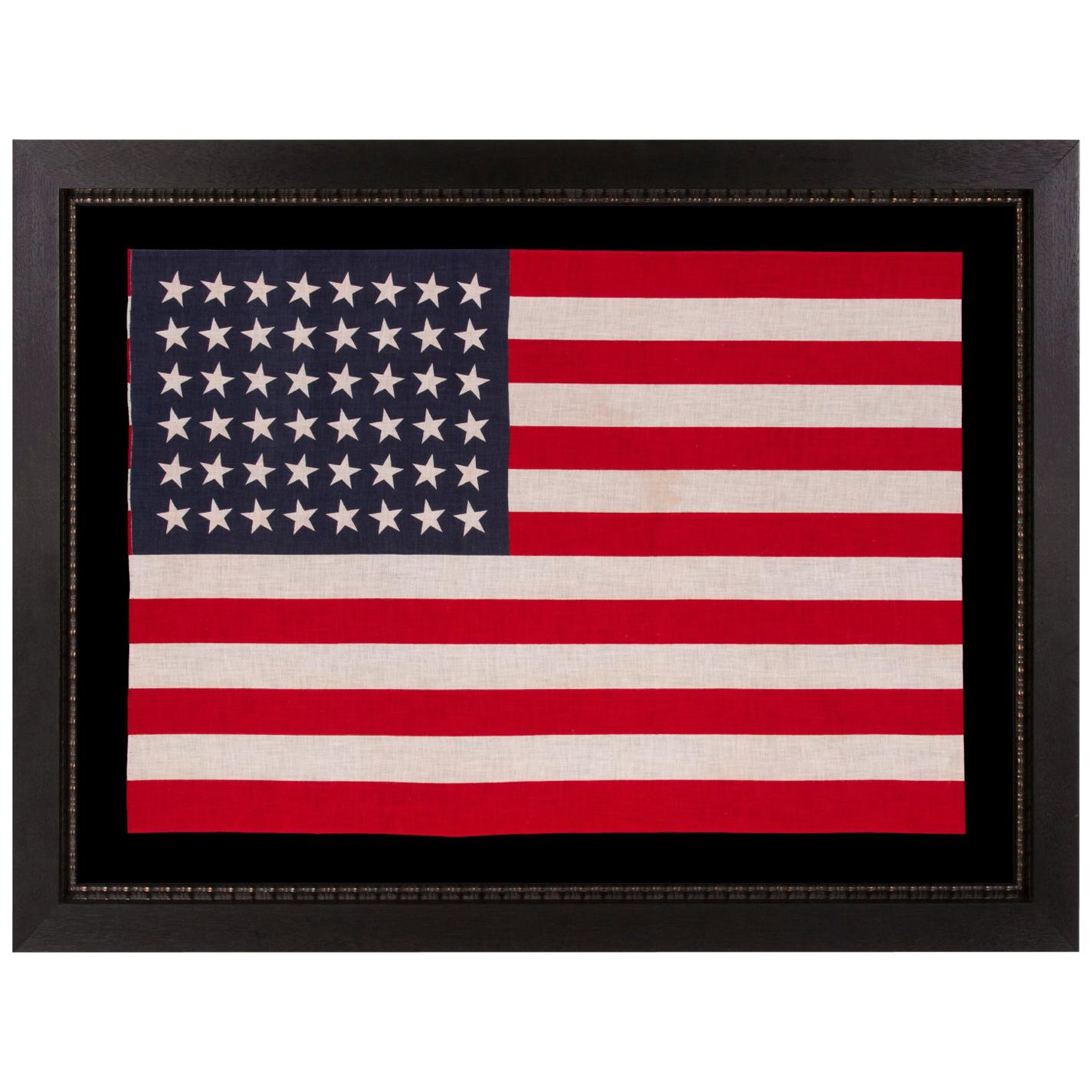 48 Star American Parade Flag with Dancing Rows of Canted Stars, ca 1912-1918