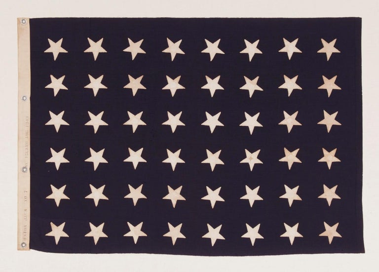 48 STAR U.S. NAVY JACK, MADE AT MARE ISLAND, CALIFORNIA, HEADQUARTERS OF THE PACIFIC FLEET, DURING WWII, DATED 1943 

United States Navy jack with 48 stars, made during WWII (U.S. involvement 1941-45) at Mare Island, California, Headquarters of the