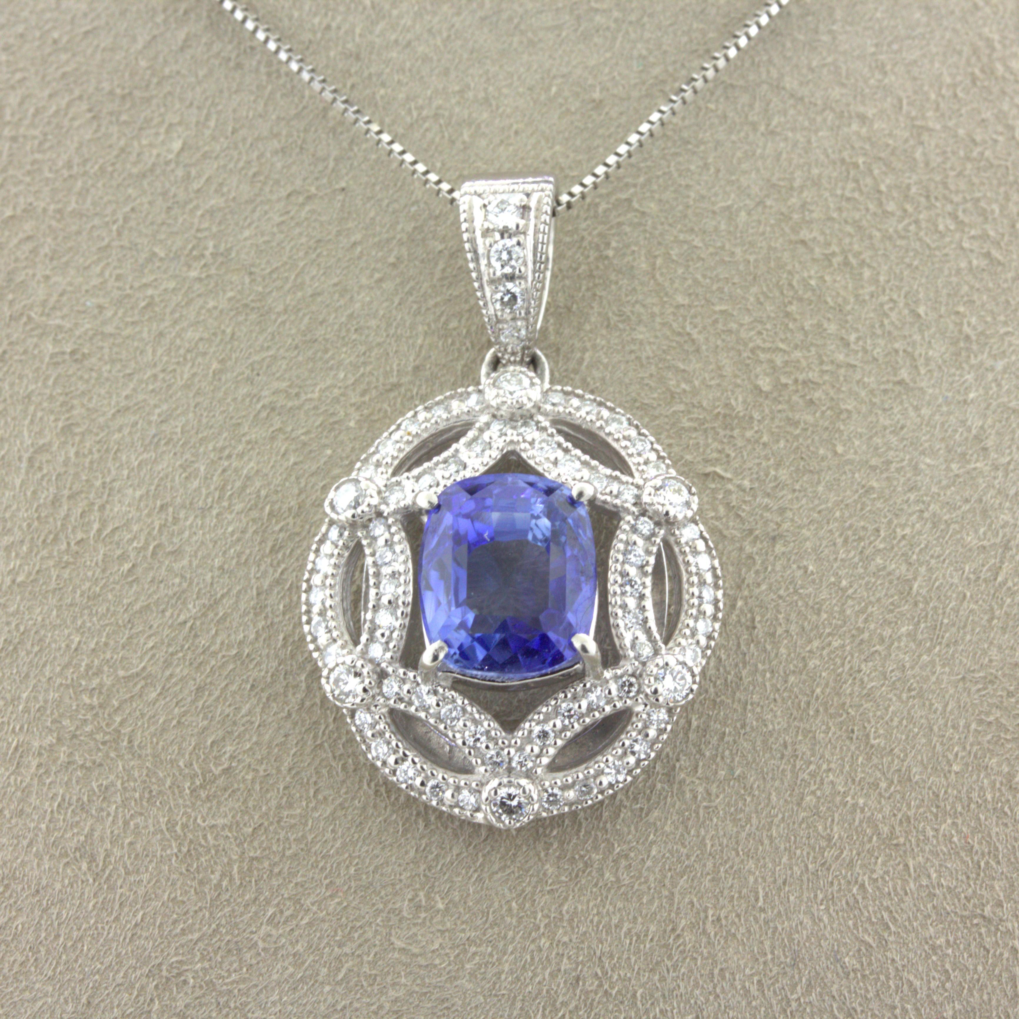 A lovely platinum pendant featuring a 4.80 carat cushion-cut blue sapphire. It has a lovely shape with excellent proportions and a soft open blue color with plenty of brightness and life. It is complemented by 0.56 carats of round brilliant-cut