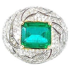 18 Karat Goldring mit 4,80 Karat Smaragd und 3,25 Karat Diamant