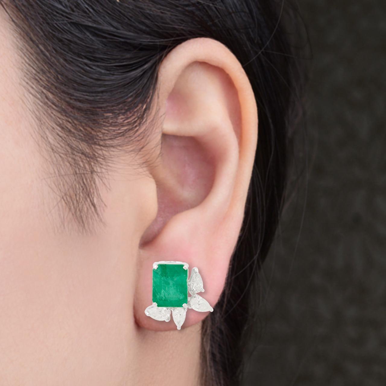 Cast in 14 karat gold, these stunning earrings are hand set with 4.80 carats emerald and 1.50 carats of glimmering diamonds. 

FOLLOW MEGHNA JEWELS storefront to view the latest collection & exclusive pieces. Meghna Jewels is proudly rated as a Top